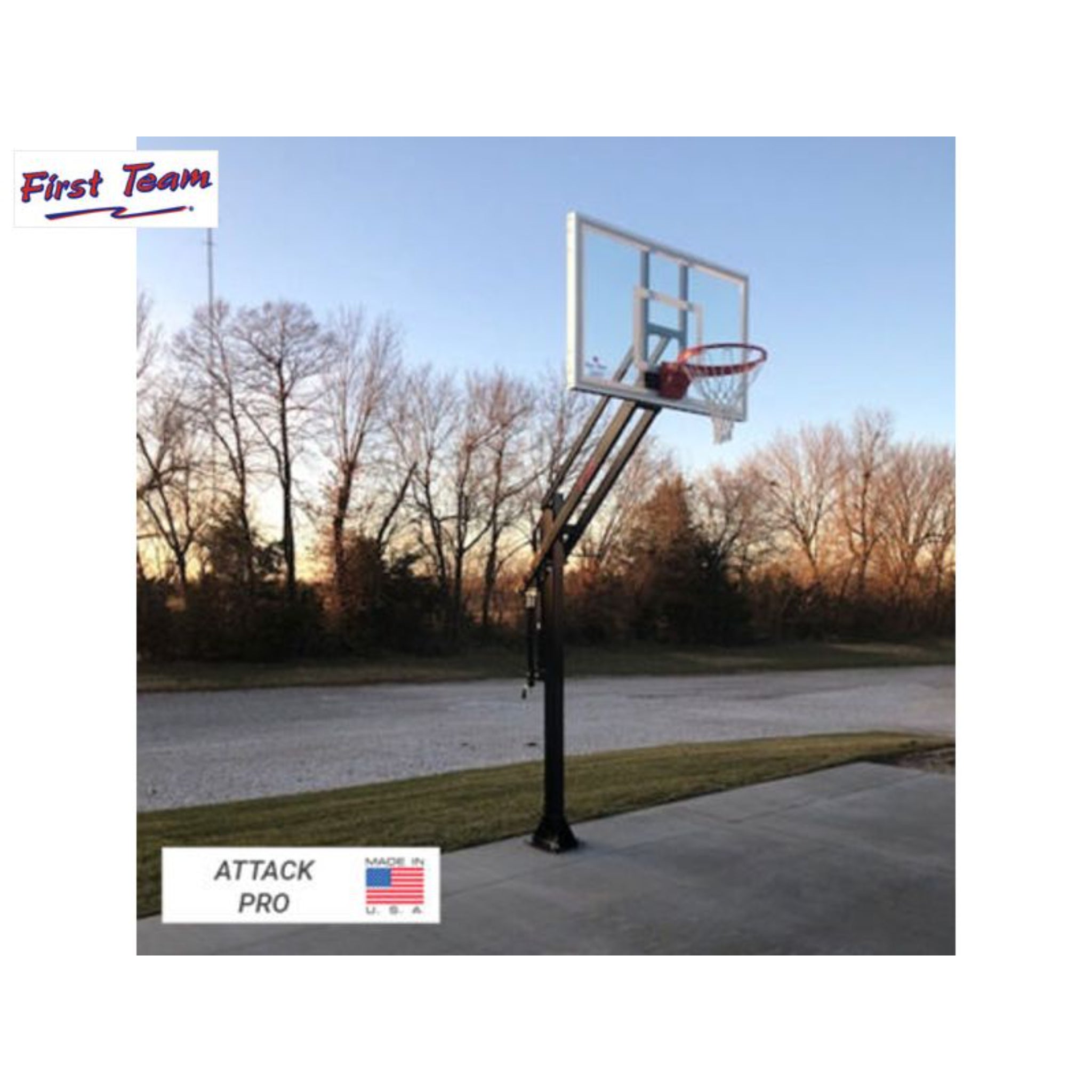 First Team Attack residential basketball goal installed on an outdoor driveway basketball court
