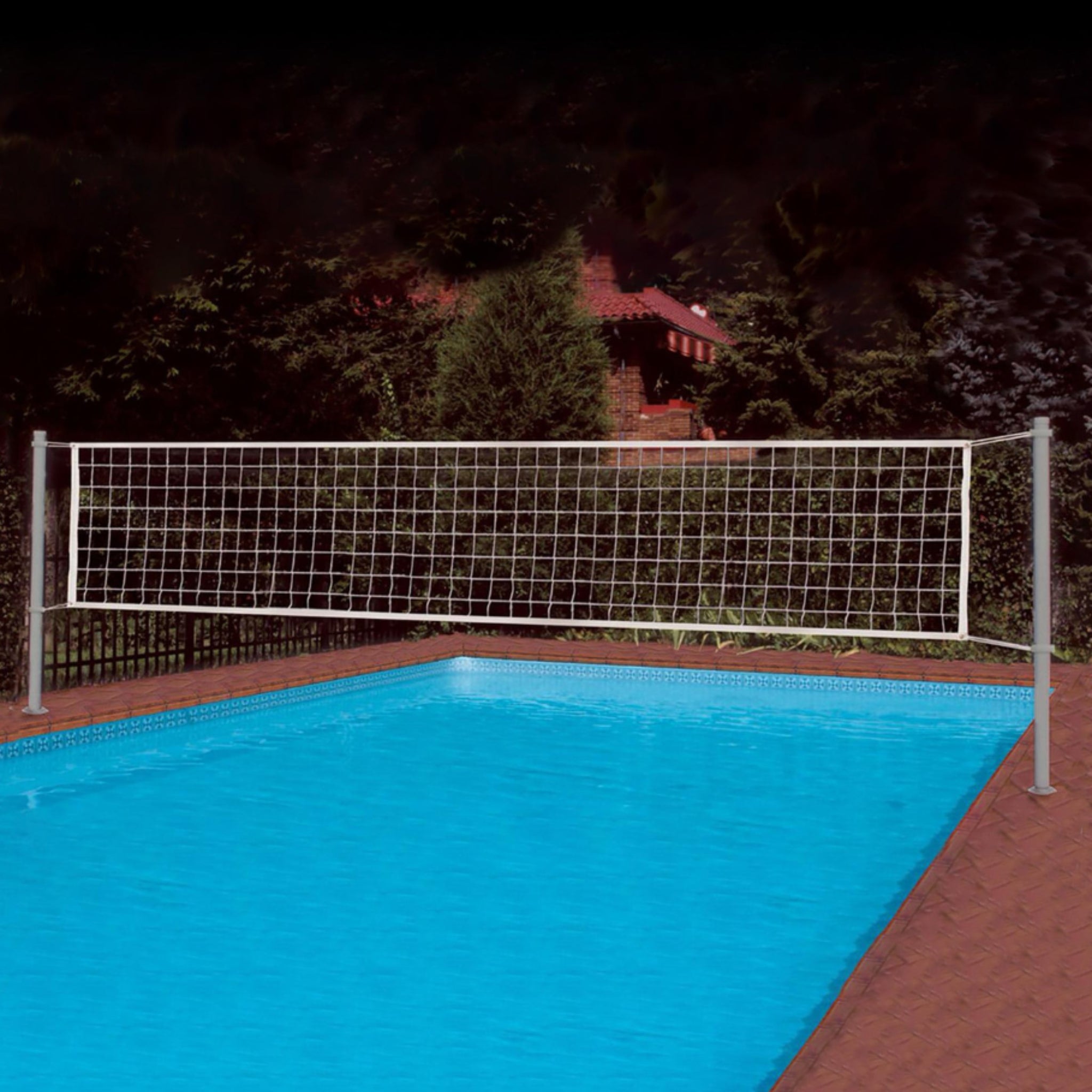 Clear Hoop Jr. pool basketball hoop and deck-mounted volleyball net set spanning residential swimming pool