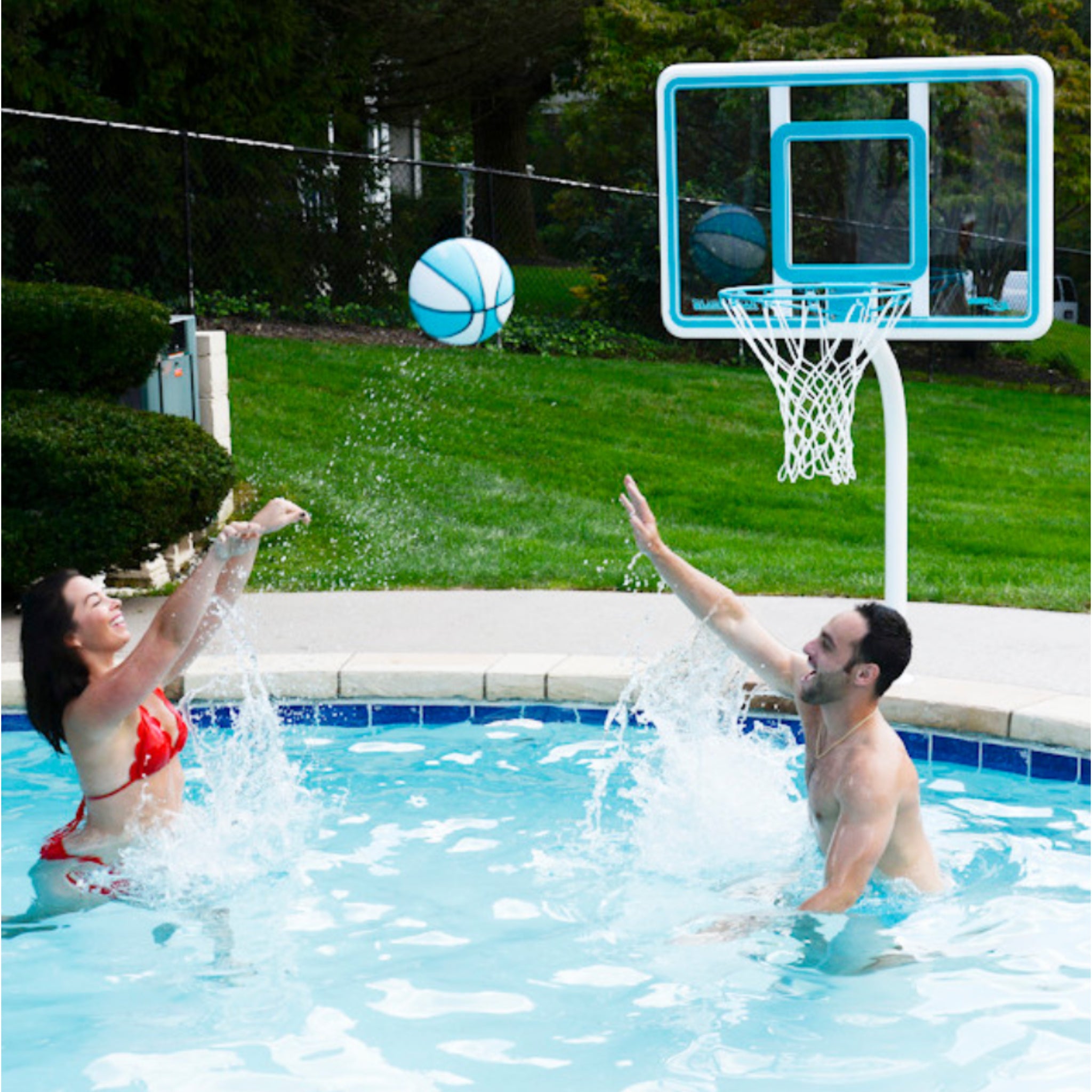 In-ground pool basketball hoop deck-mounted poolside