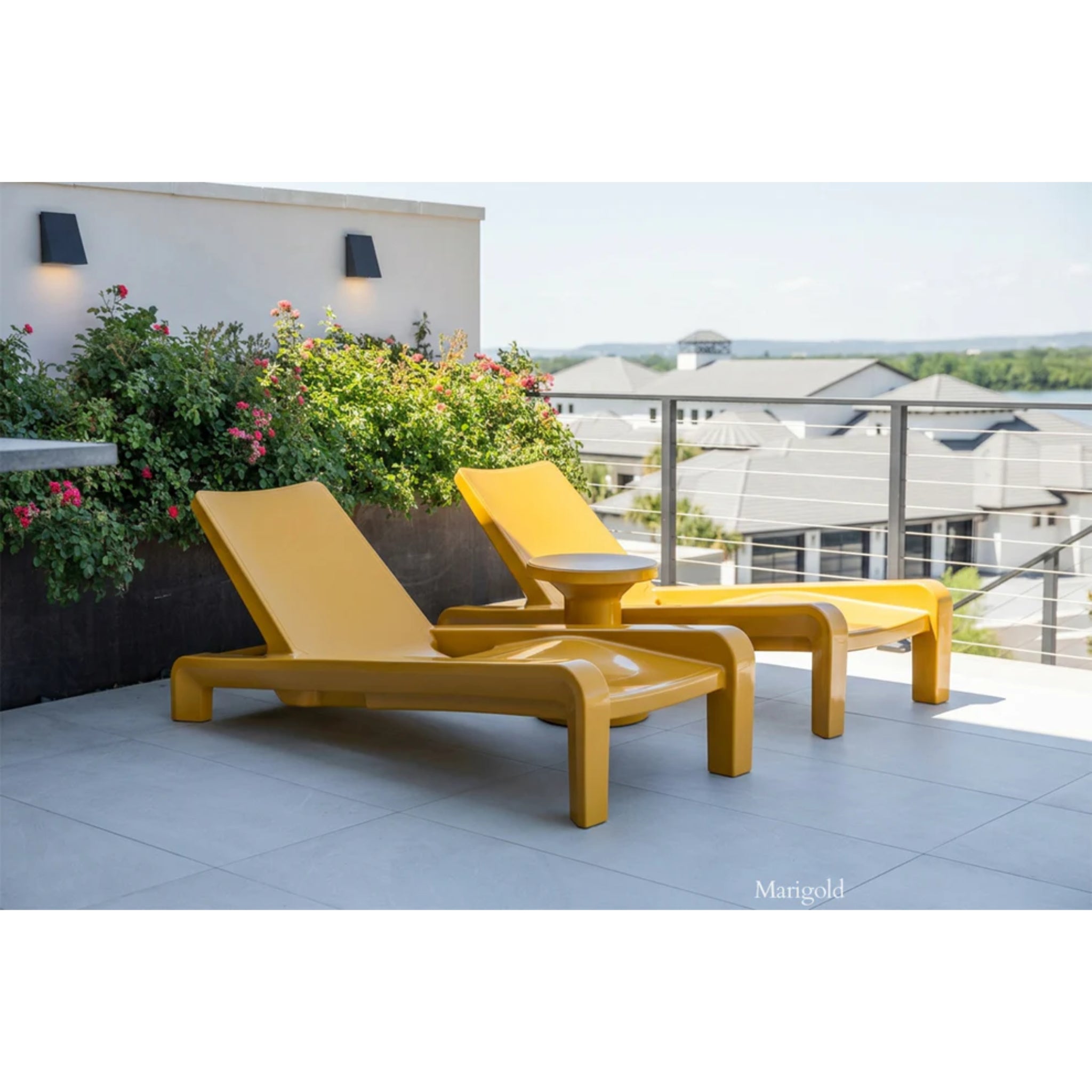Marigold in-pool chaise lounges adding vibrant resort-style comfort to a luxury outdoor living space