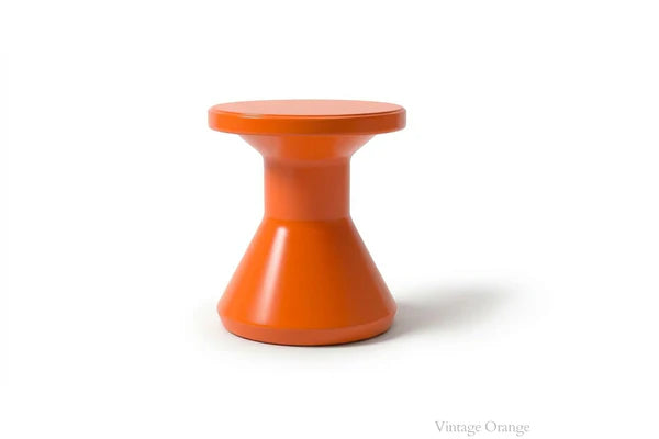Orange Tupelo Fluent in-pool side table can be paired with luxury outdoor lounge chairs