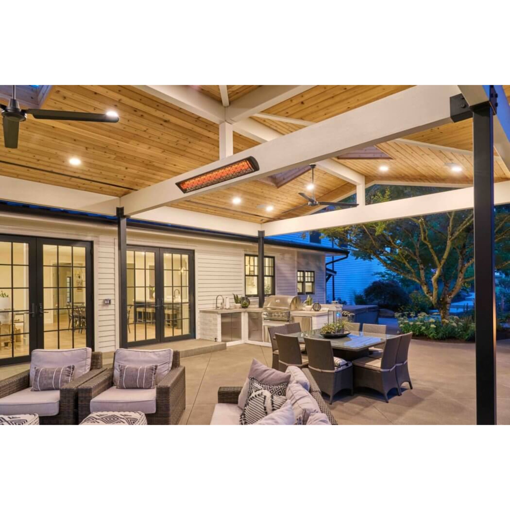 Infratech CD series dual element infrared electric patio heater installed on ceiling of outdoor patio with motif decorative faceplate