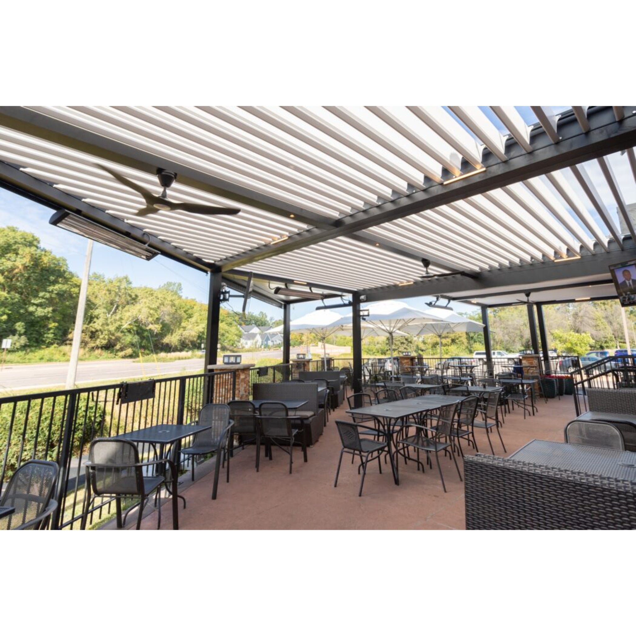 Infratech CD series dual element outdoor electric patio heater installed on restaurant patio