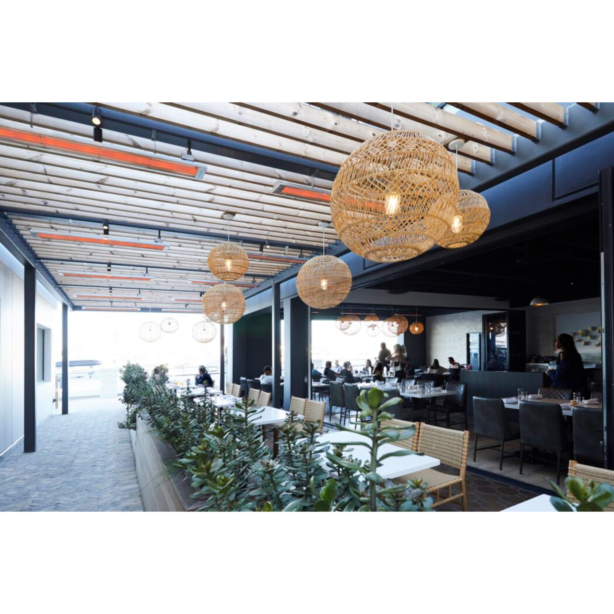 Infratech CD series dual element infrared electric patio heater installed in commercial restaurant area