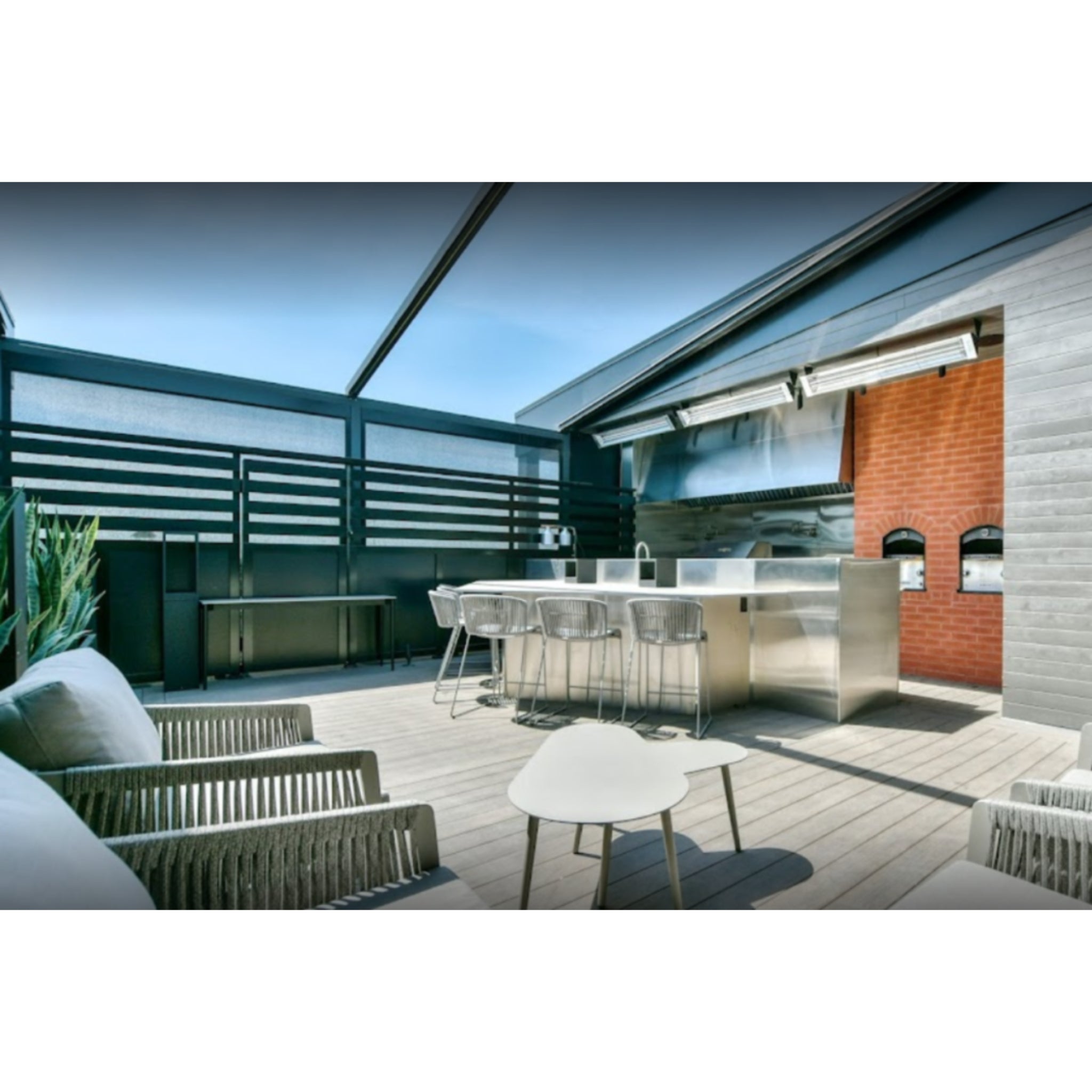 Infratech WD Series dual element heater installed above an outdoor bar area
