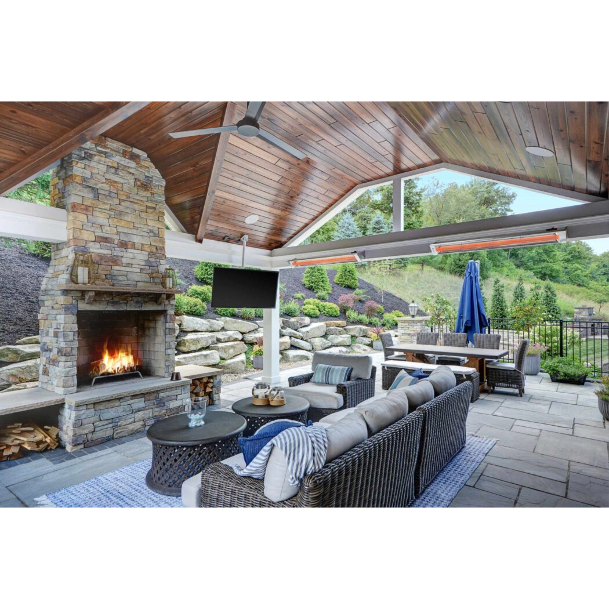 Infratech WD Series infrared heater in stainless steel finish on a contemporary home exterior