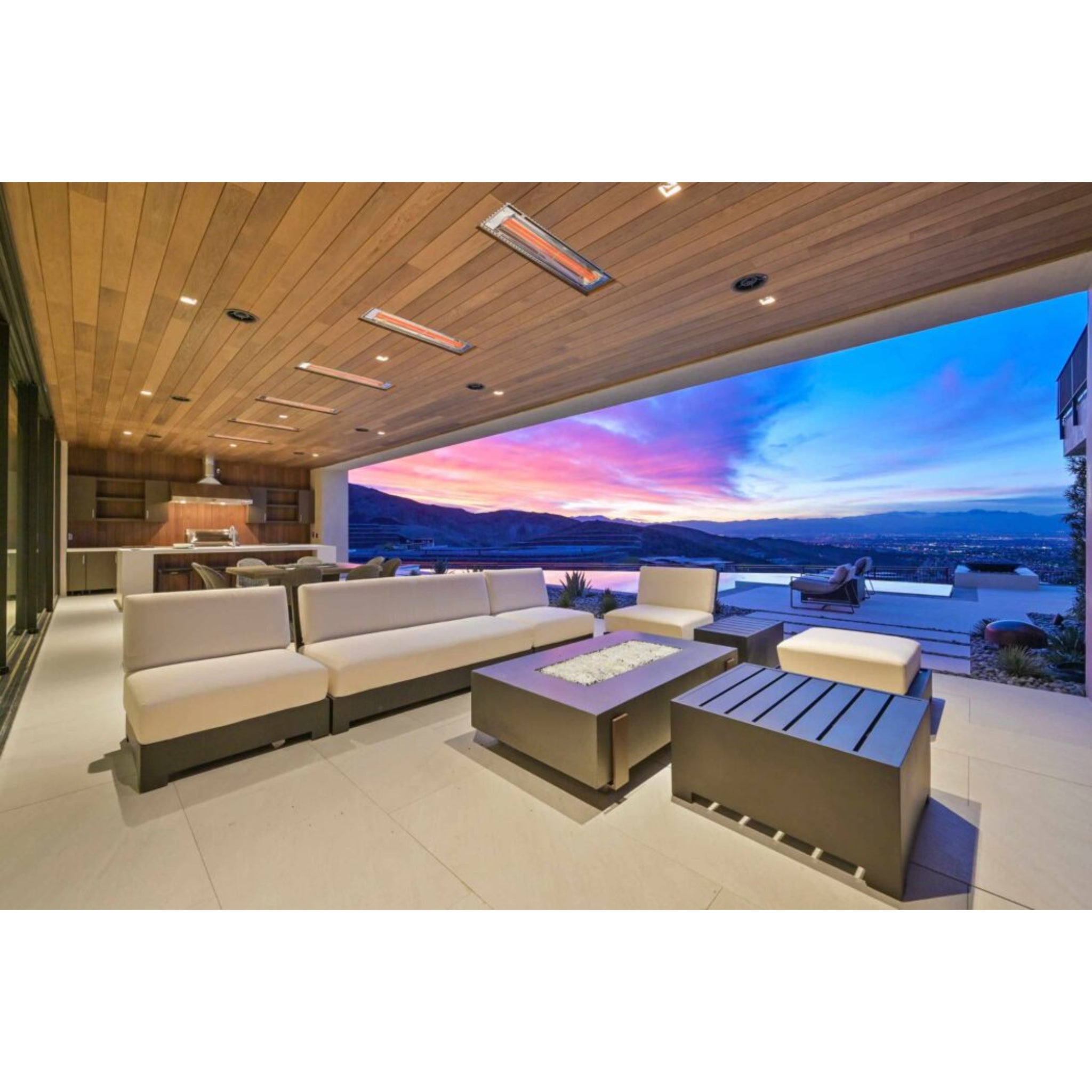 Infratech WD Series ceiling flush mounted heater in a luxury backyard outdoor patio in stainless steel finish
