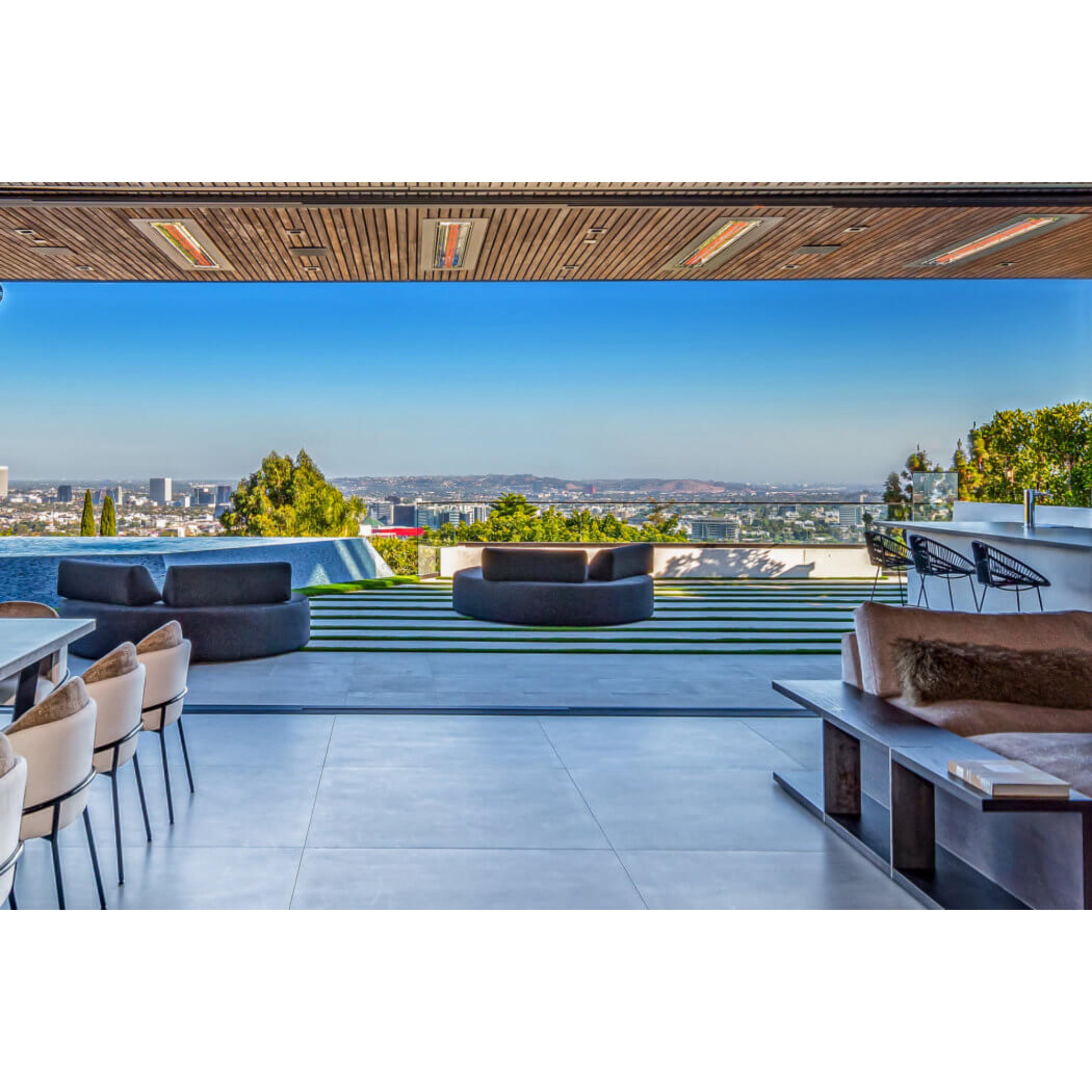 Infratech WD Series electric heater flush mounted in ceiling in a resort-style terrace