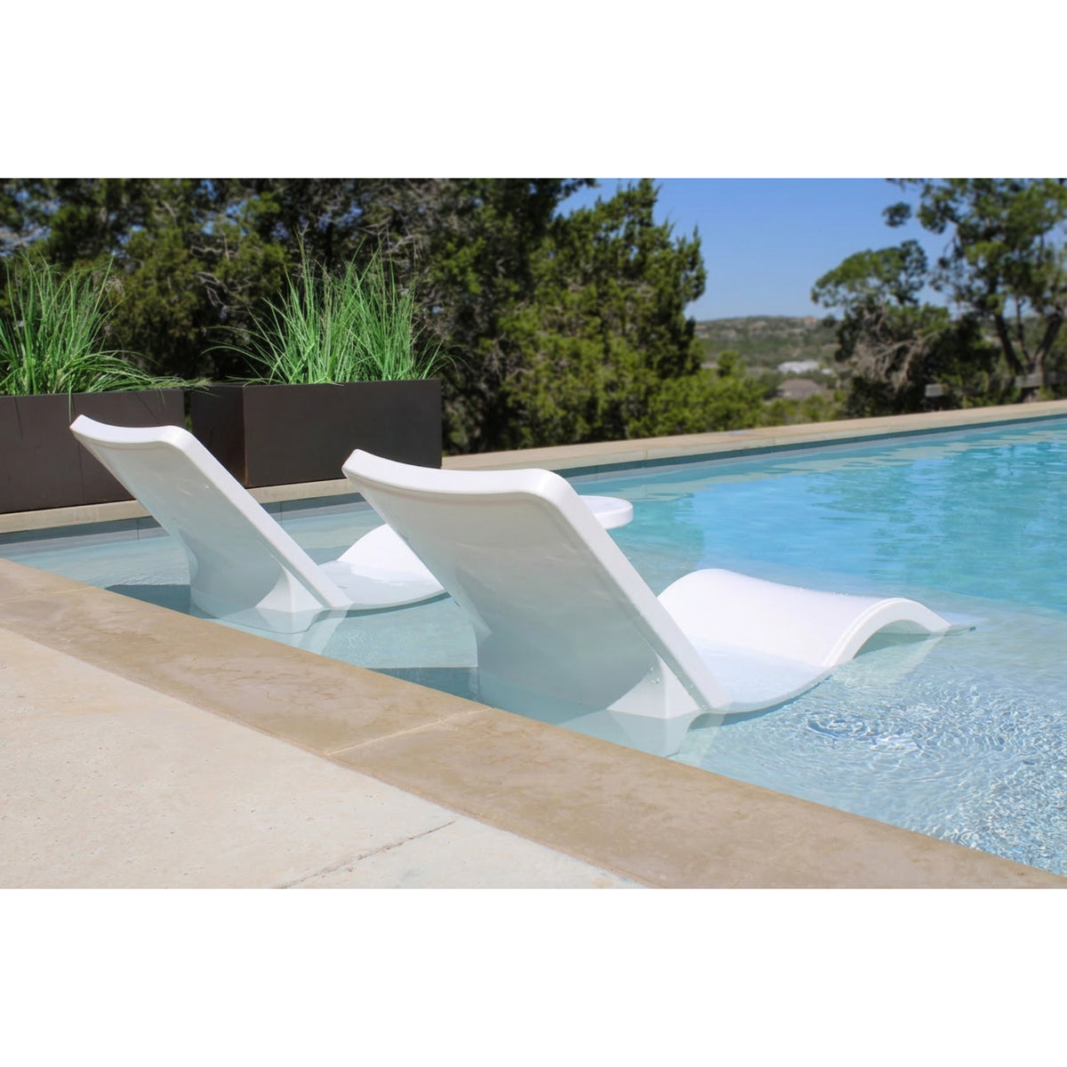 Tanning ledge lounge chair built for durability in sun, chlorine, and water exposure