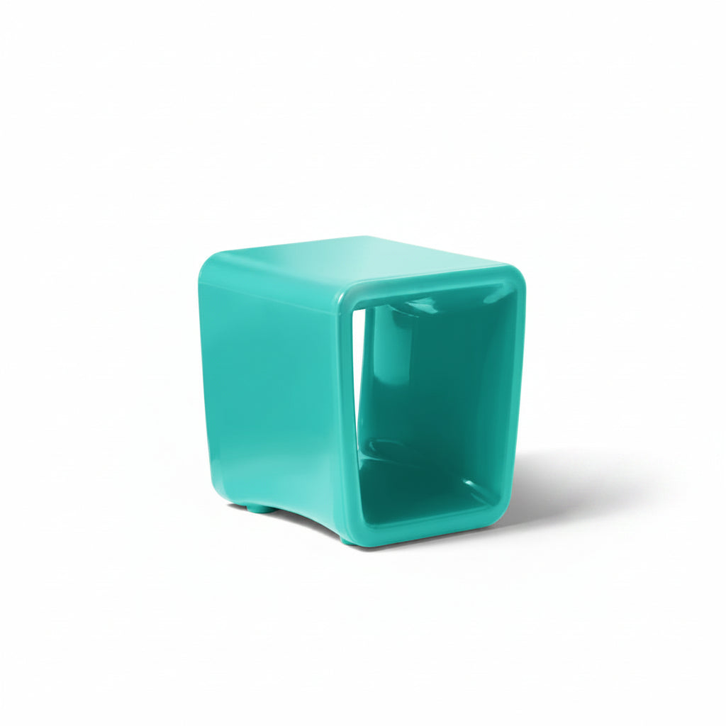 Turquoise cube-shaped side table on a white background