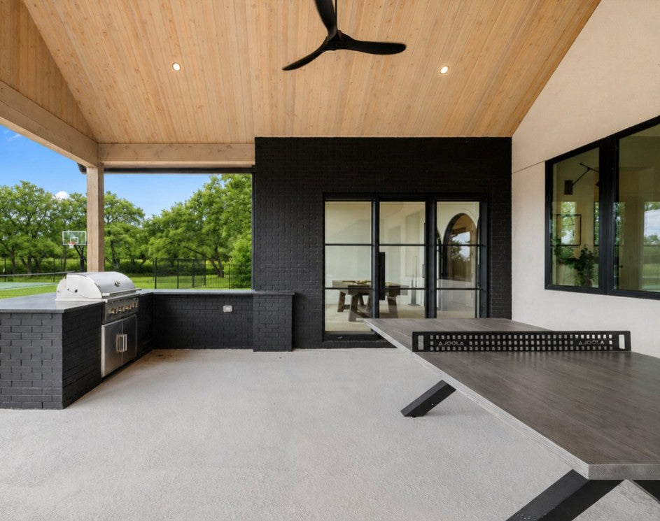 JOOLA Berkshire outdoor ping pong table on patio of luxury vacation rental