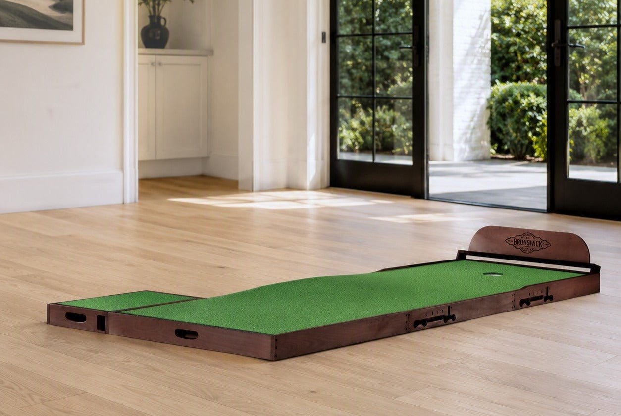 Indoor putting green designed for year-round golf practice and entertainment