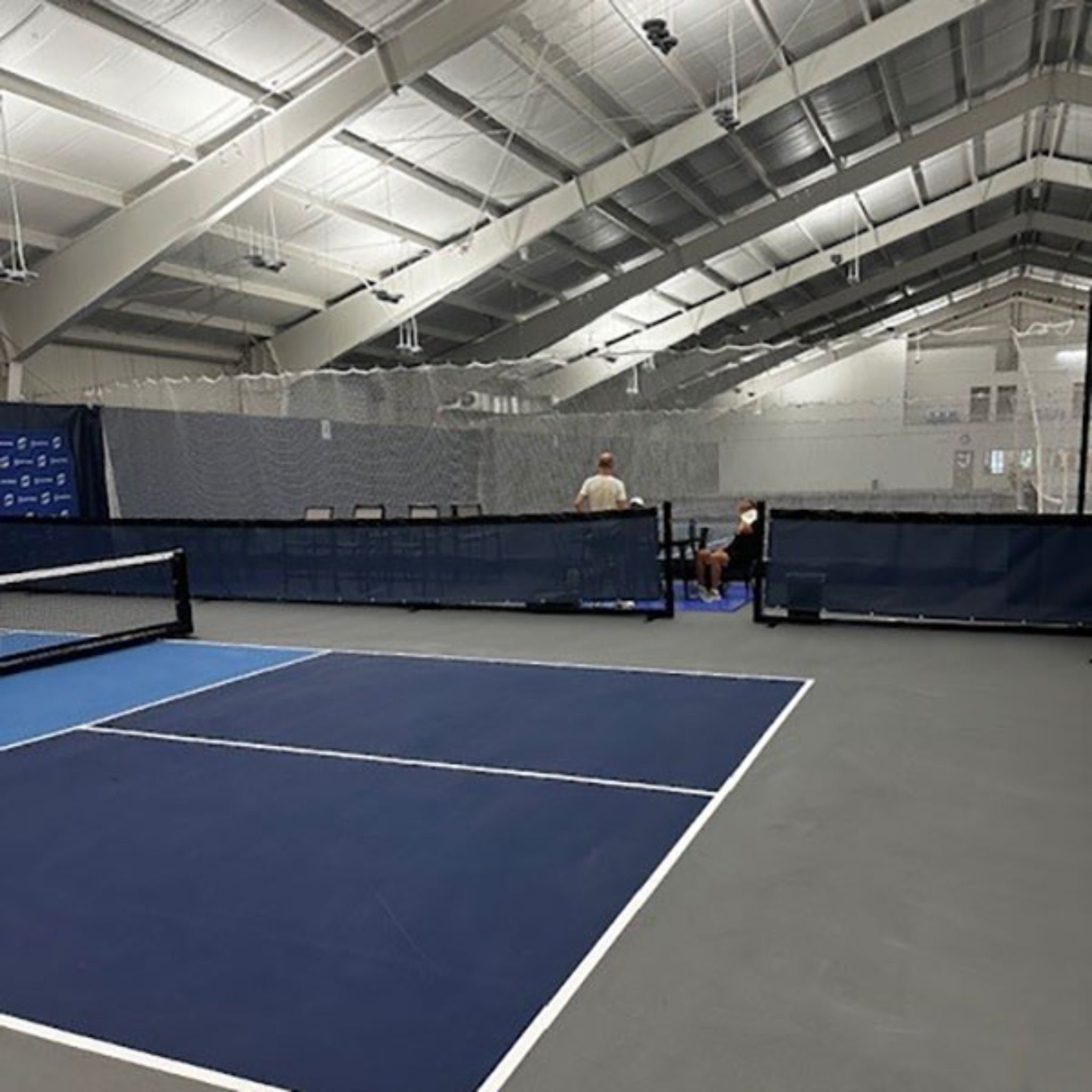 Modular pickleball divider system for multiple court layout