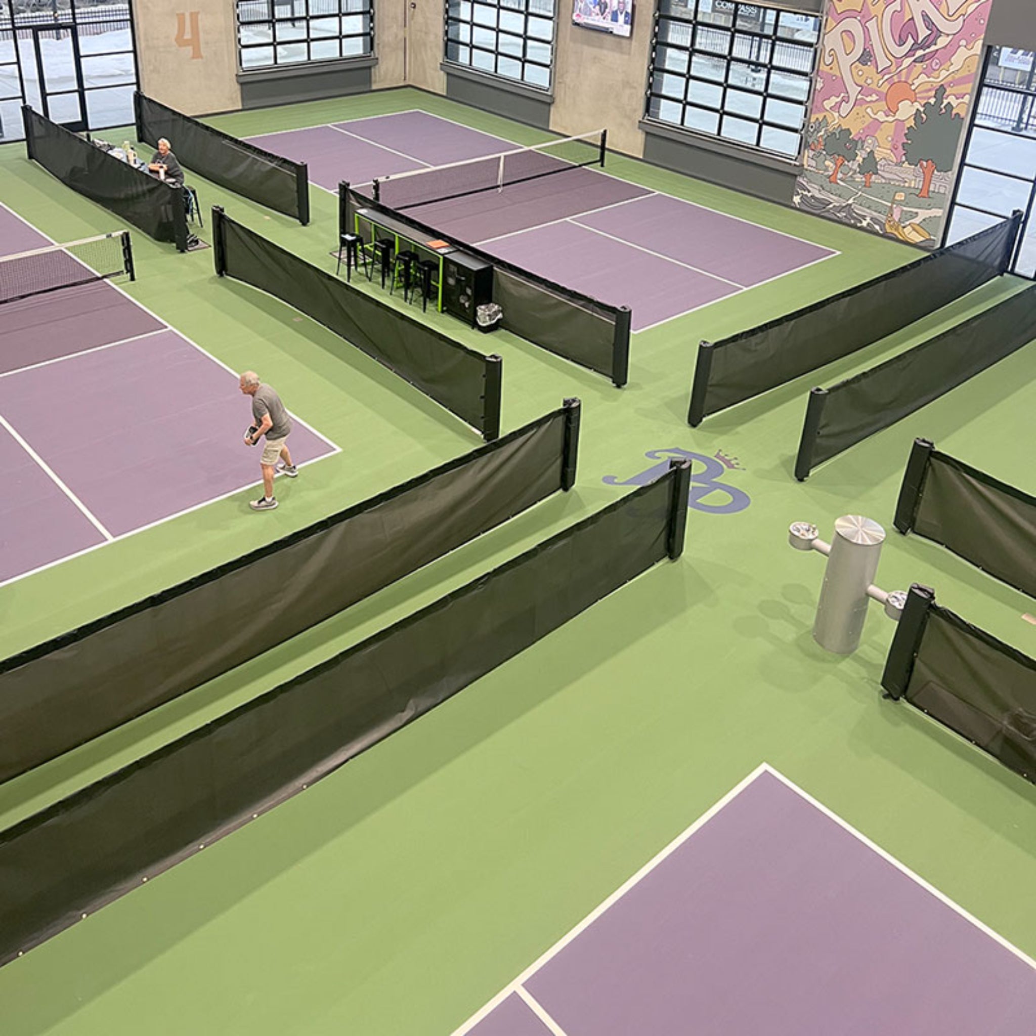 Douglas in-ground pickleball court divider system multi-court layout