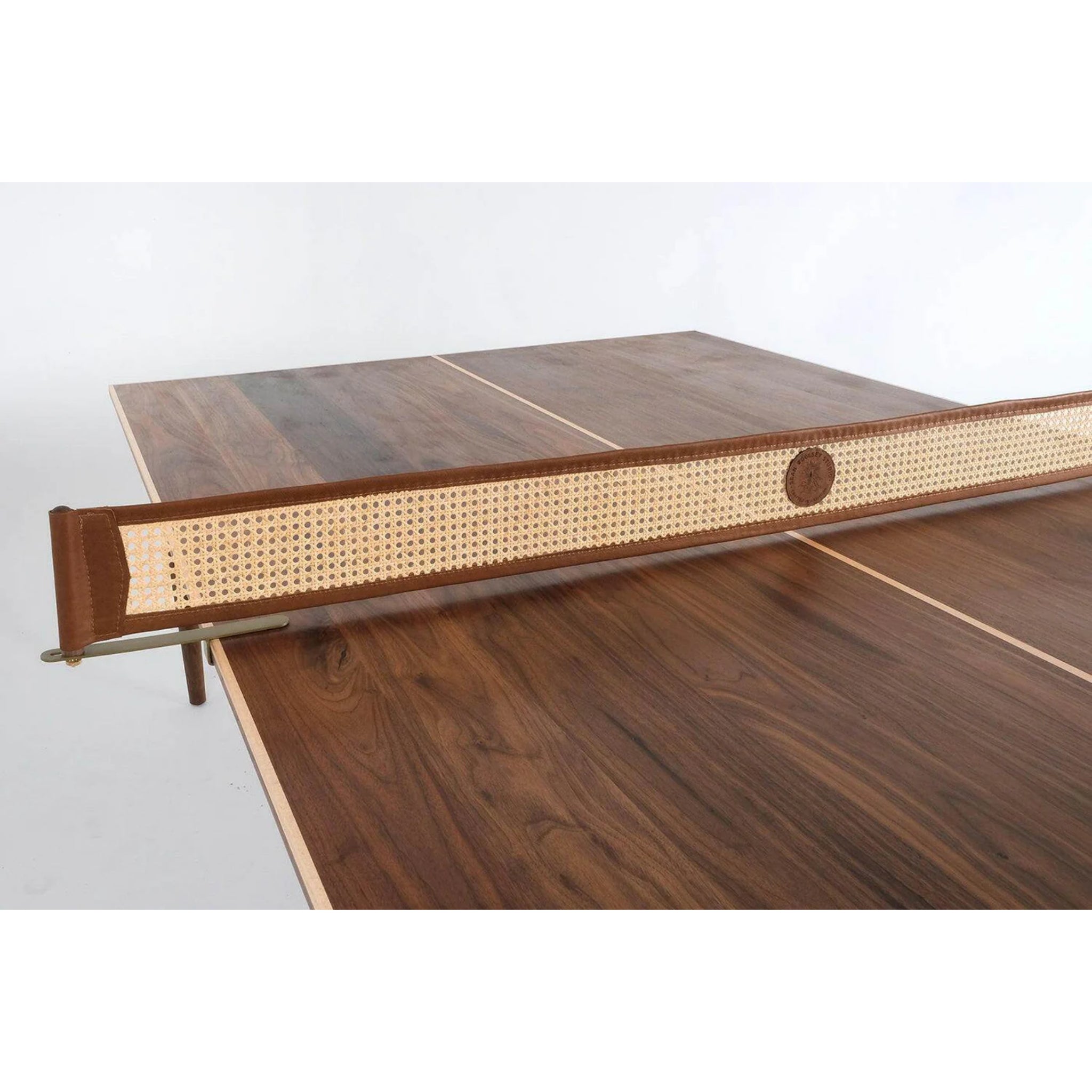 Walnut ping pong table with cane net close-up detail