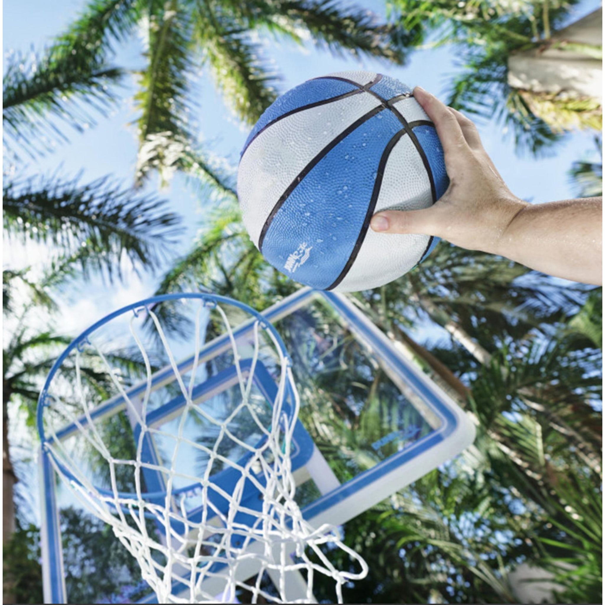 Close-up of Splash & Shoot basketball hoop rim and net over swimming pool in clear blue color option