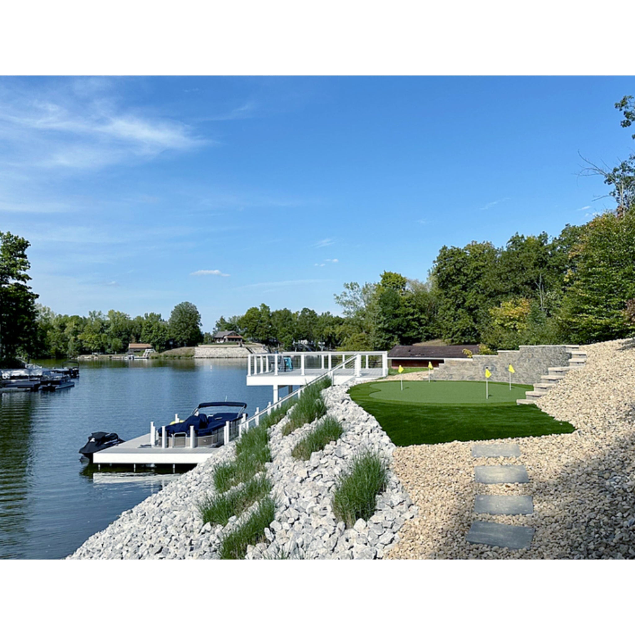 The Monterey Southampton Outdoor Putting Green, DIY Backyard putting green kit with premium turf and base system, installed lakeside lifestyle image