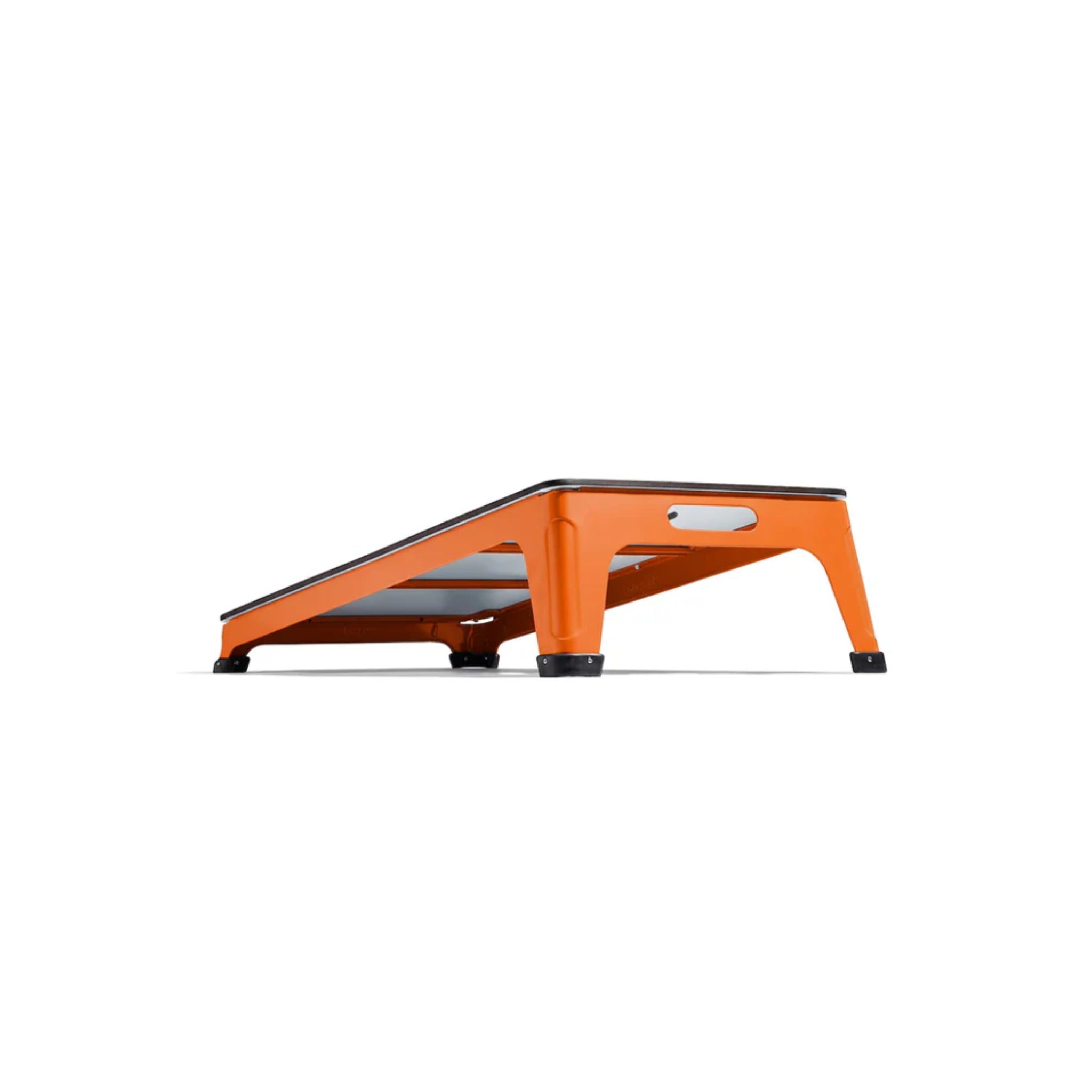 Rear view of Tupelo all-weather cornhole board in vintage orange color, showcasing welded steel construction and elevated outdoor game design