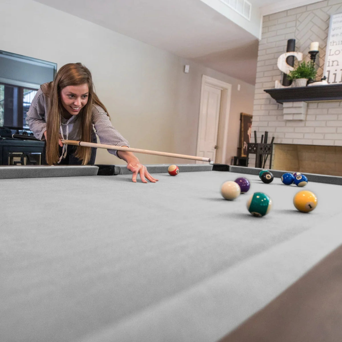 Atomic Hampton convertible dining and game table in gray wood grain finish with upholstered bench seating