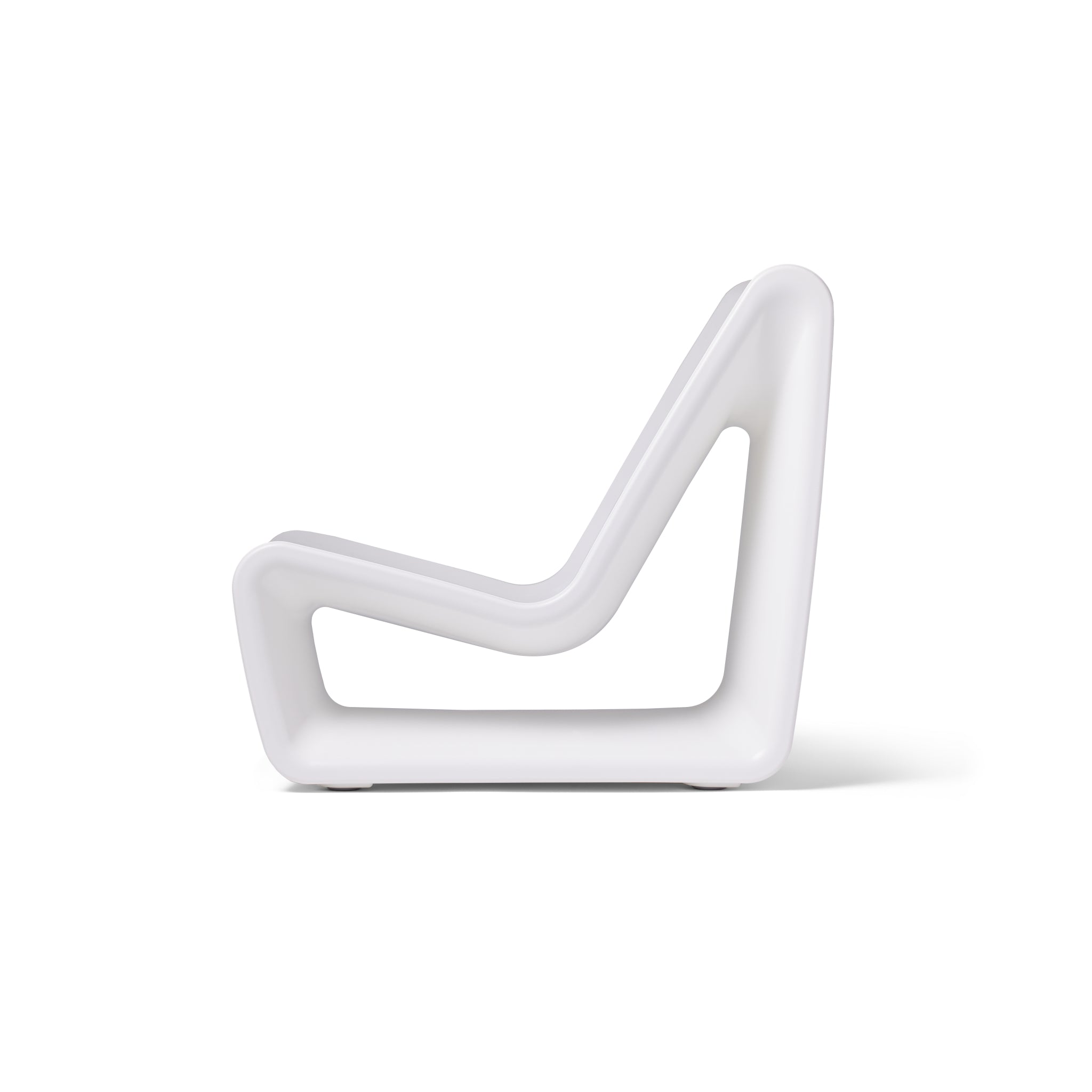 The elegant side profile of a Loop Lounge chair in Highcloud White, showcasing its sleek, sculptural curves and modern minimalist design for a luxury pool or patio setting.