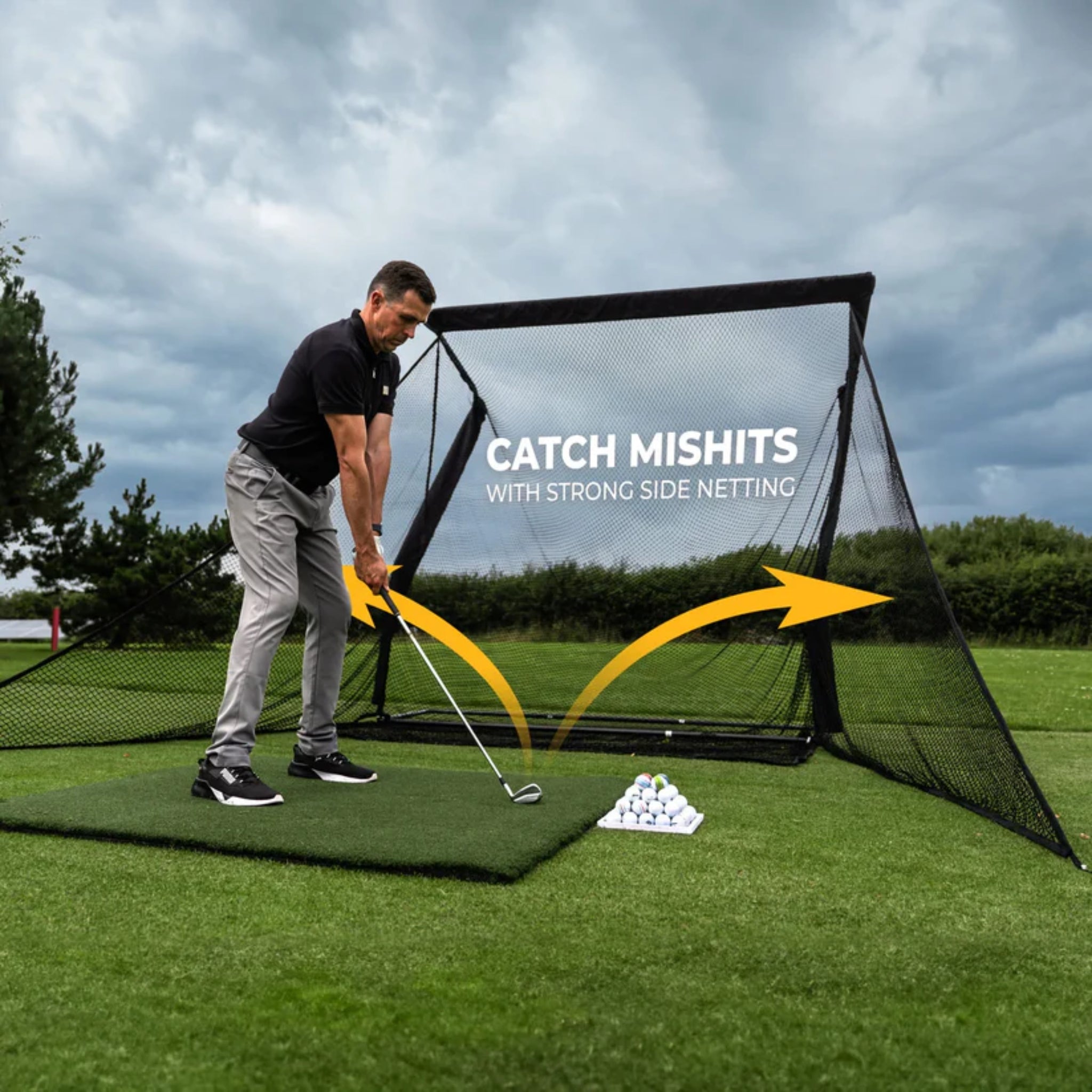 Wide SimSpace golf practice net with extended side barriers for catching mishit golf shots