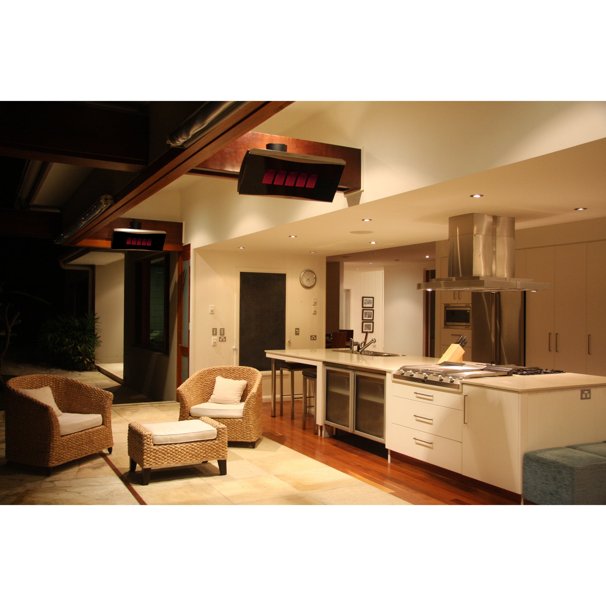 Bromic Platinum Outdoor Gas Heater installed on residential patio at night