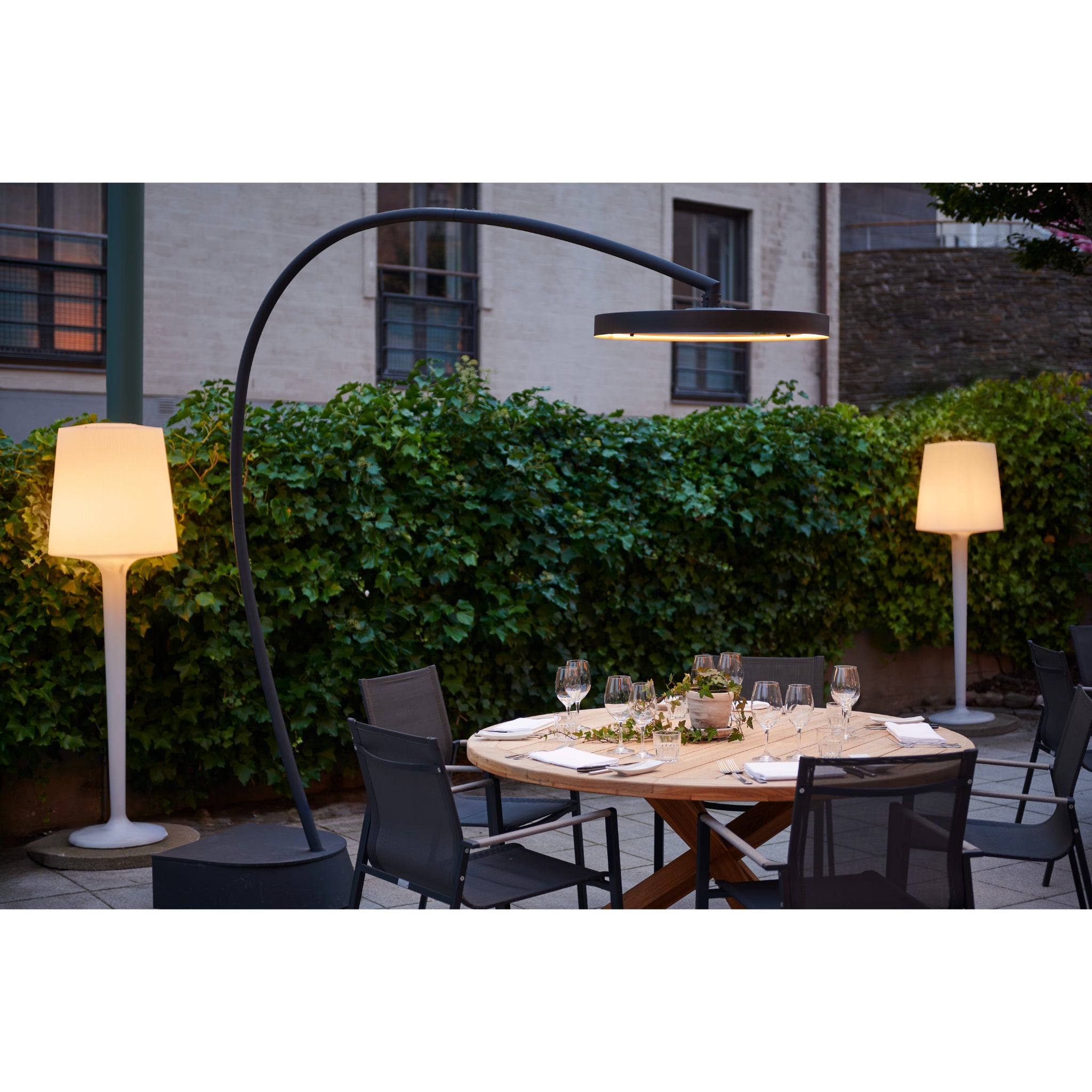 Modern freestanding electric patio heater from Bromic Eclipse series for contemporary design