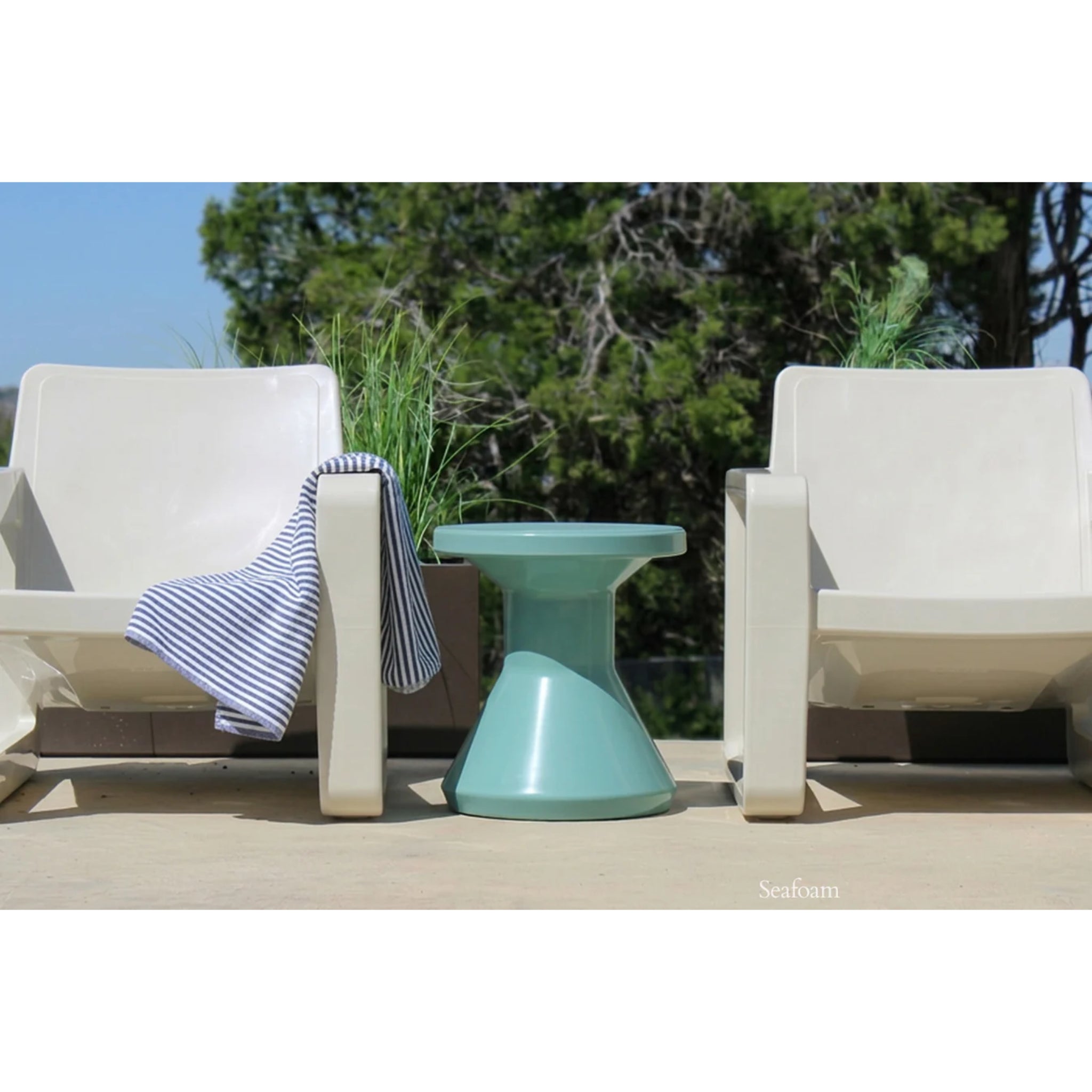 Durable pool side table for shallow water and outdoor patio use