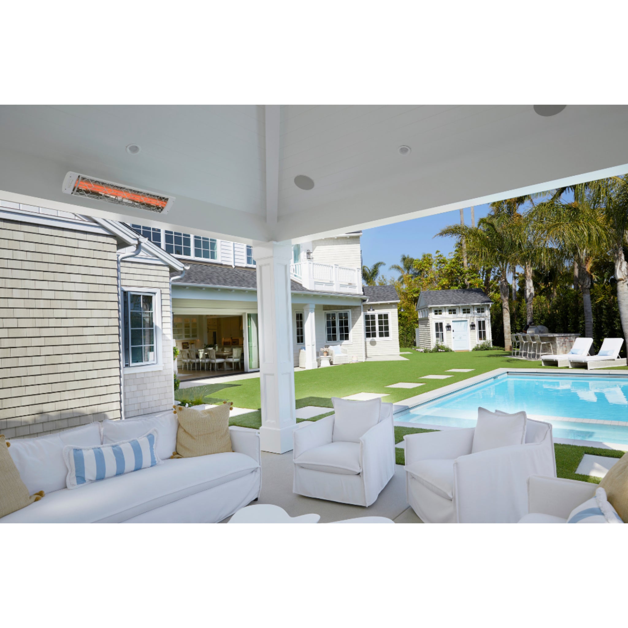 Infratech CD series dual element  infrared electric patio heater installed on ceiling of outdoor patio in white finish with motif faceplate