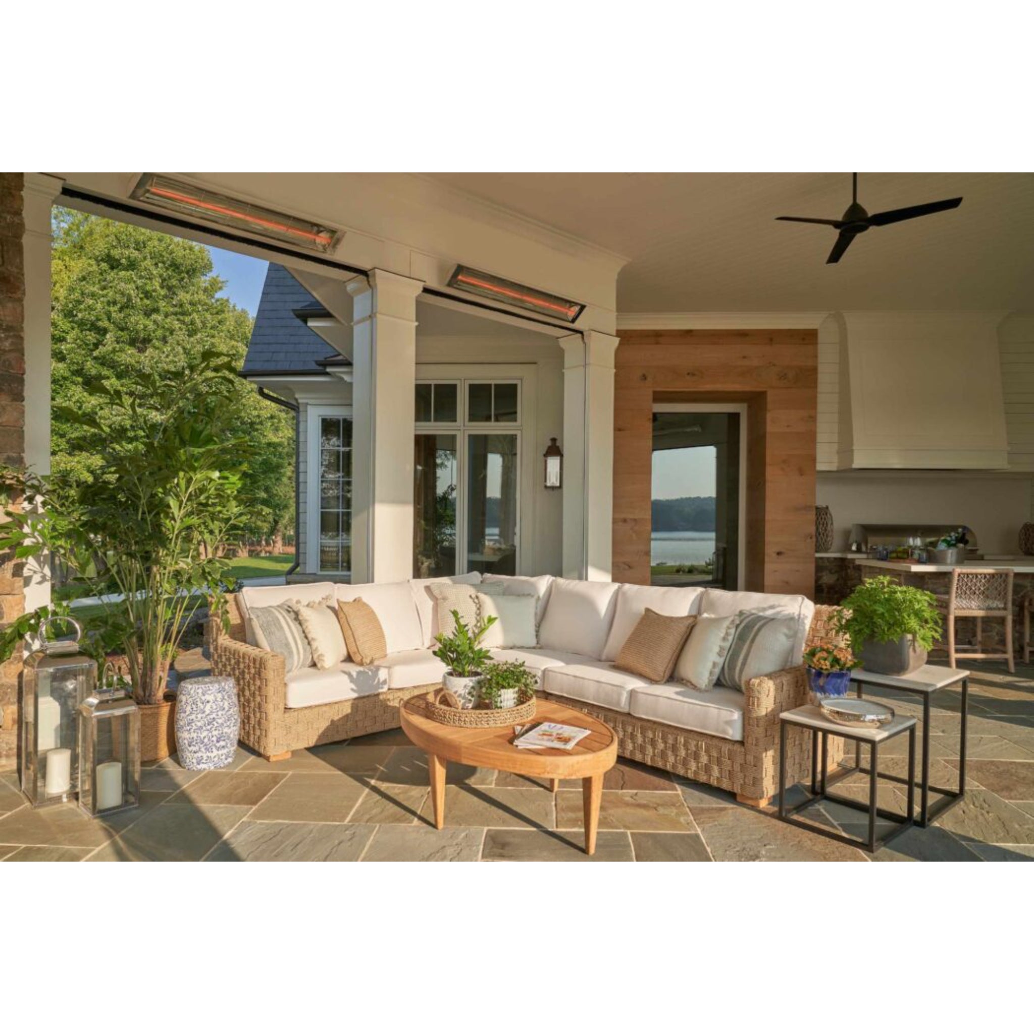 Infratech C Series electric infrared heater providing directional warmth over an outdoor seating area on patio