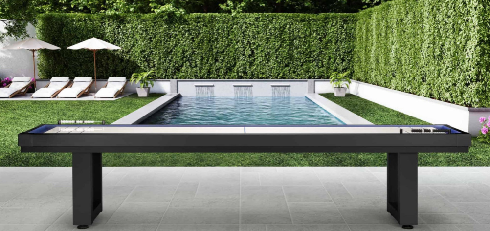 Outdoor American Heritage shuffleboard table with a pool in the background