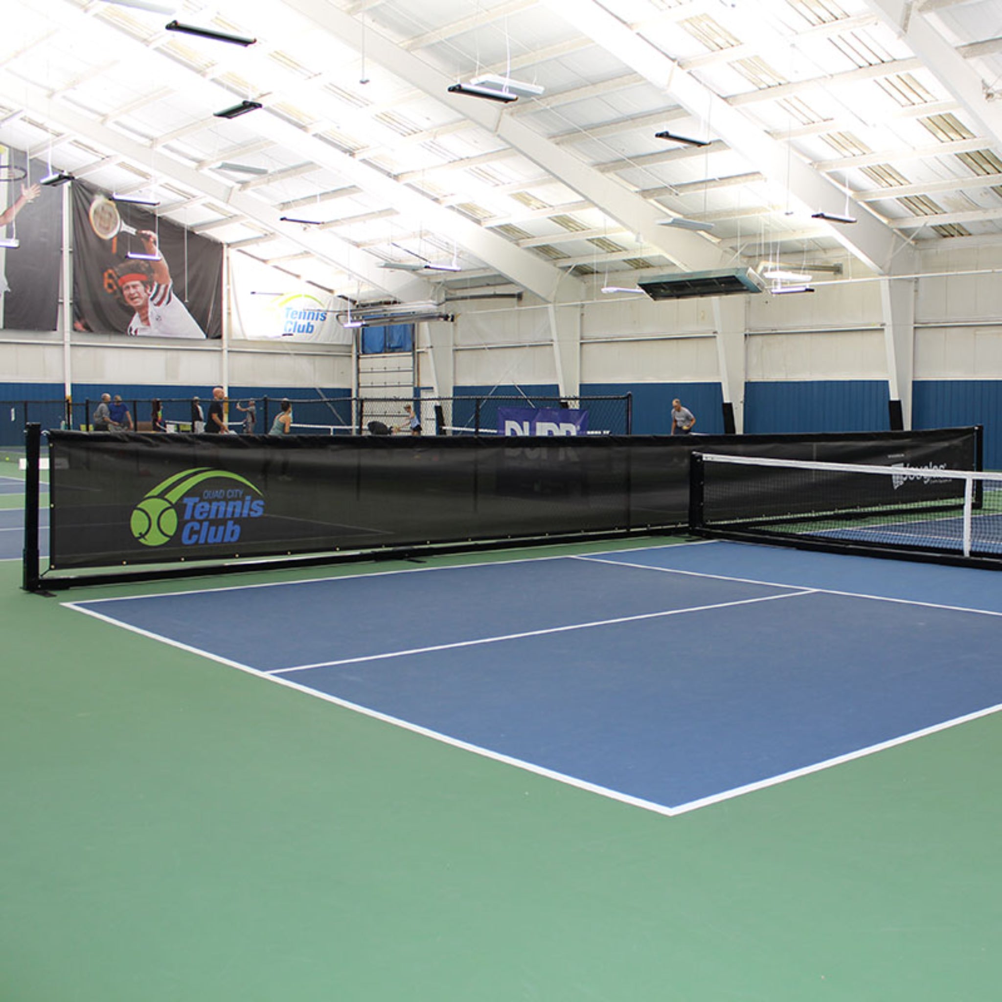 Douglas Sports movable pickleball court divider system for indoor facility