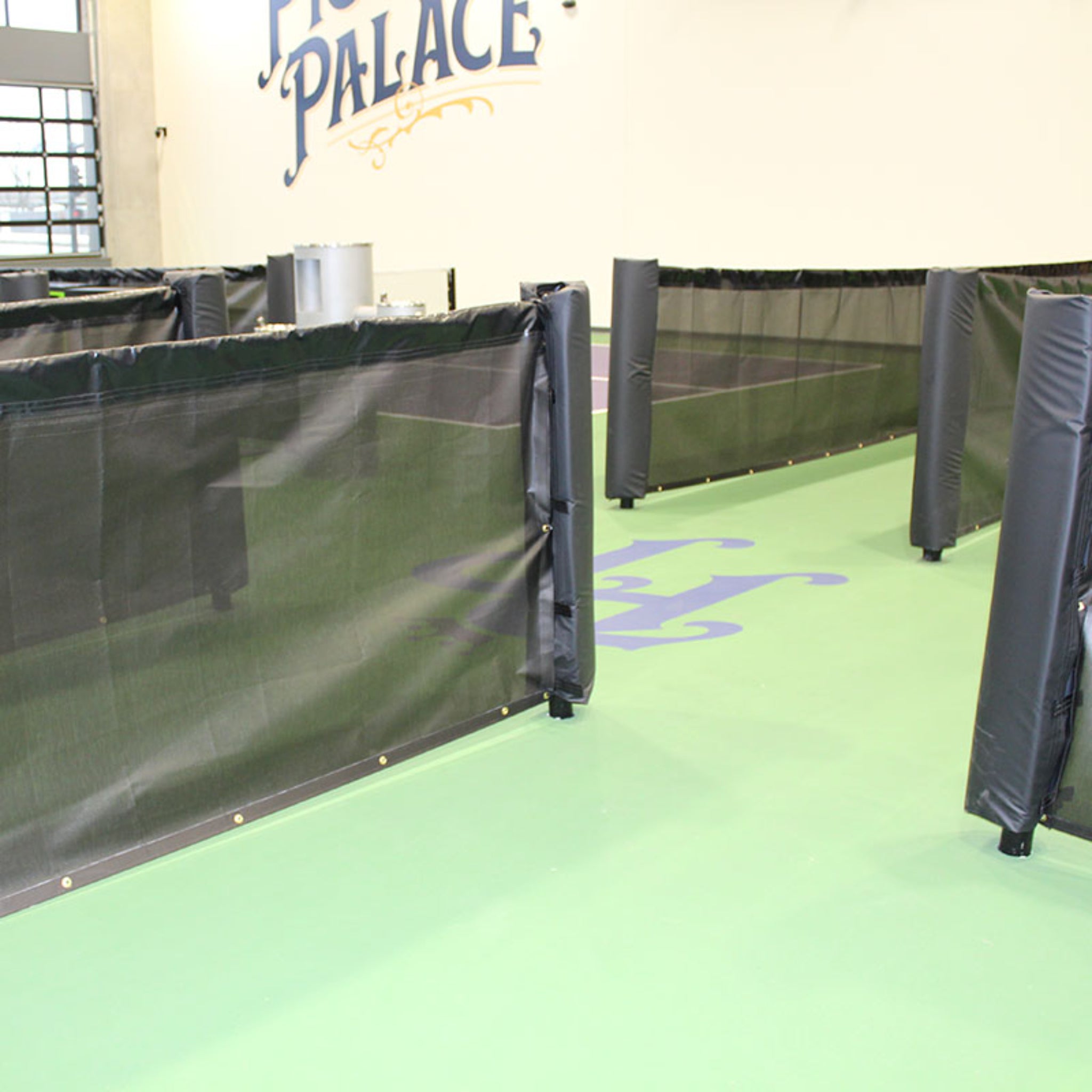 Commercial pickleball court divider system for indoor facility