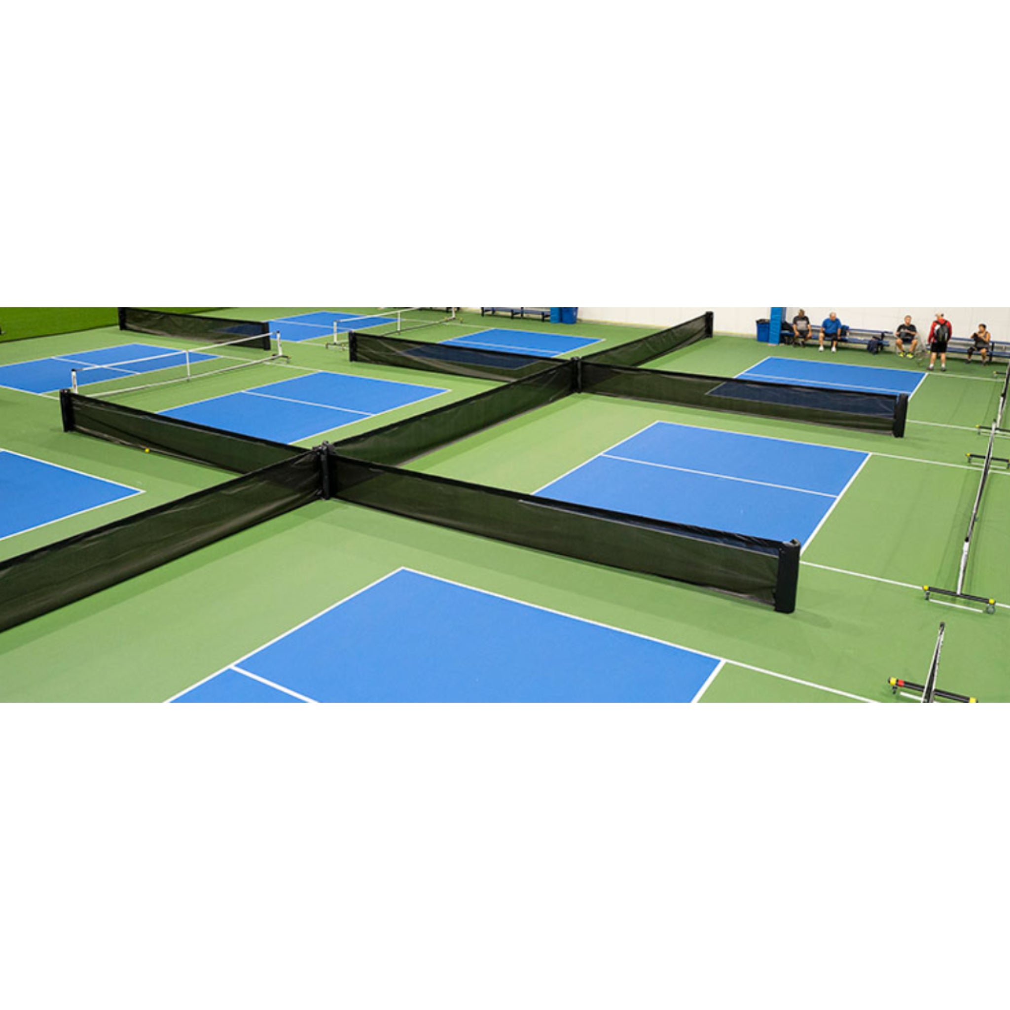 Permanent pickleball divider panels with steel posts installed