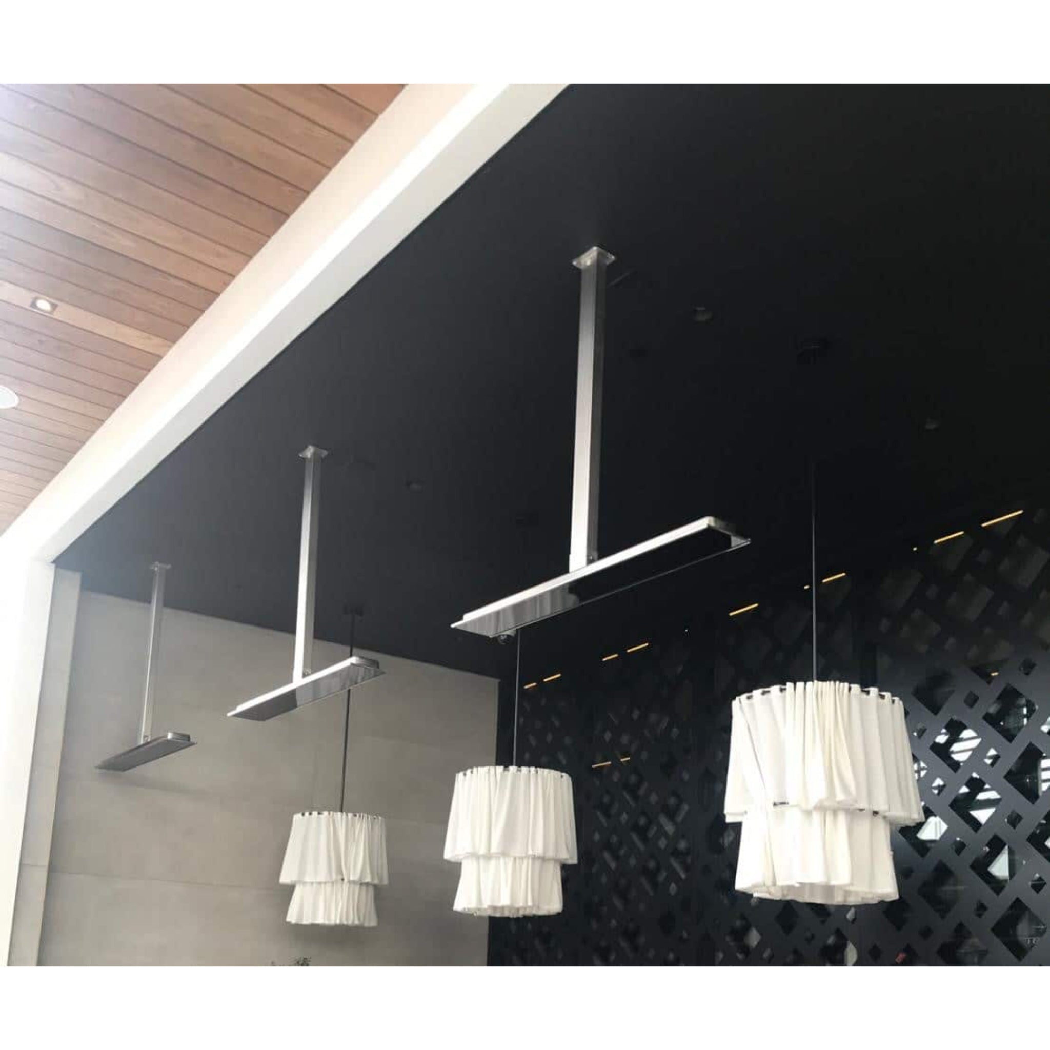 Bromic Platinum Electric Heater installed at restaurant with ceiling mount suspension kit