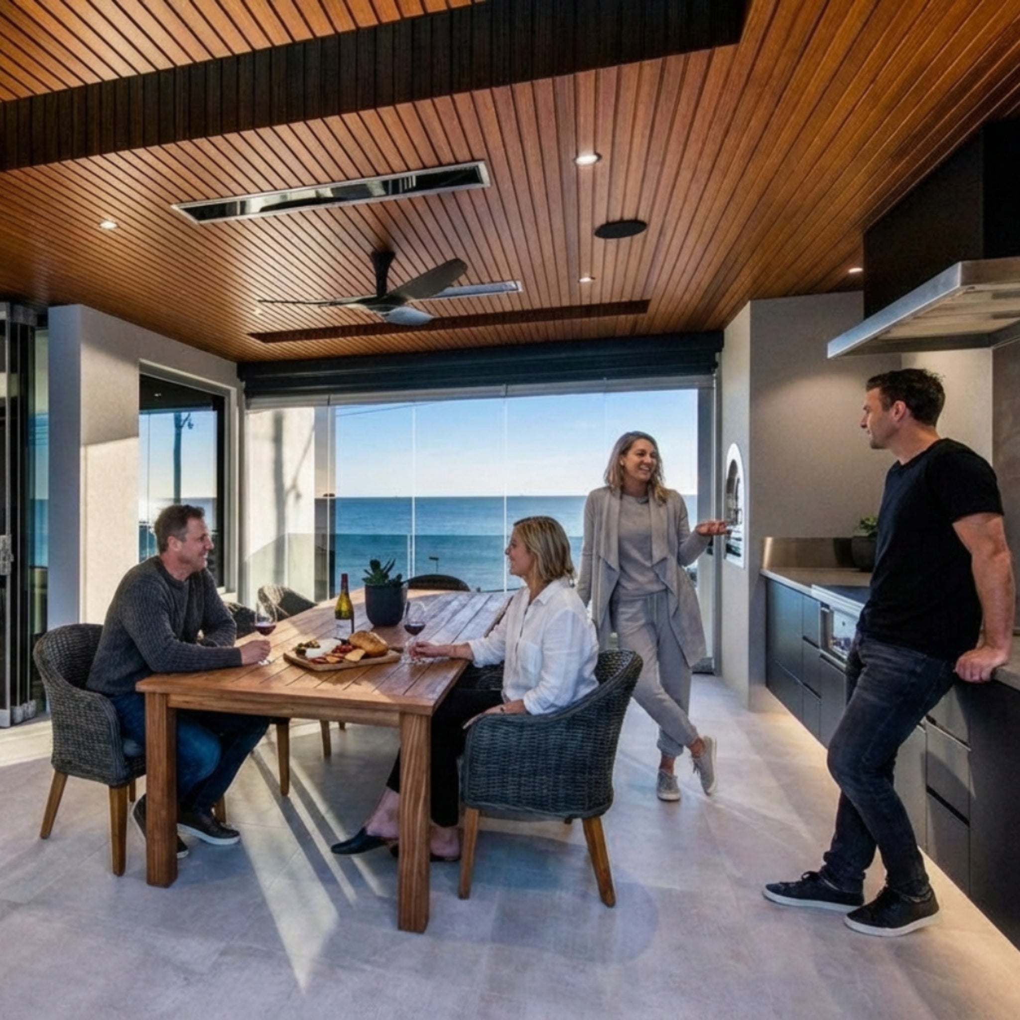 Bromic Platinum Smart-Heat Electric Marine patio heater mounted on ceiling in modern coastal home on the ocean