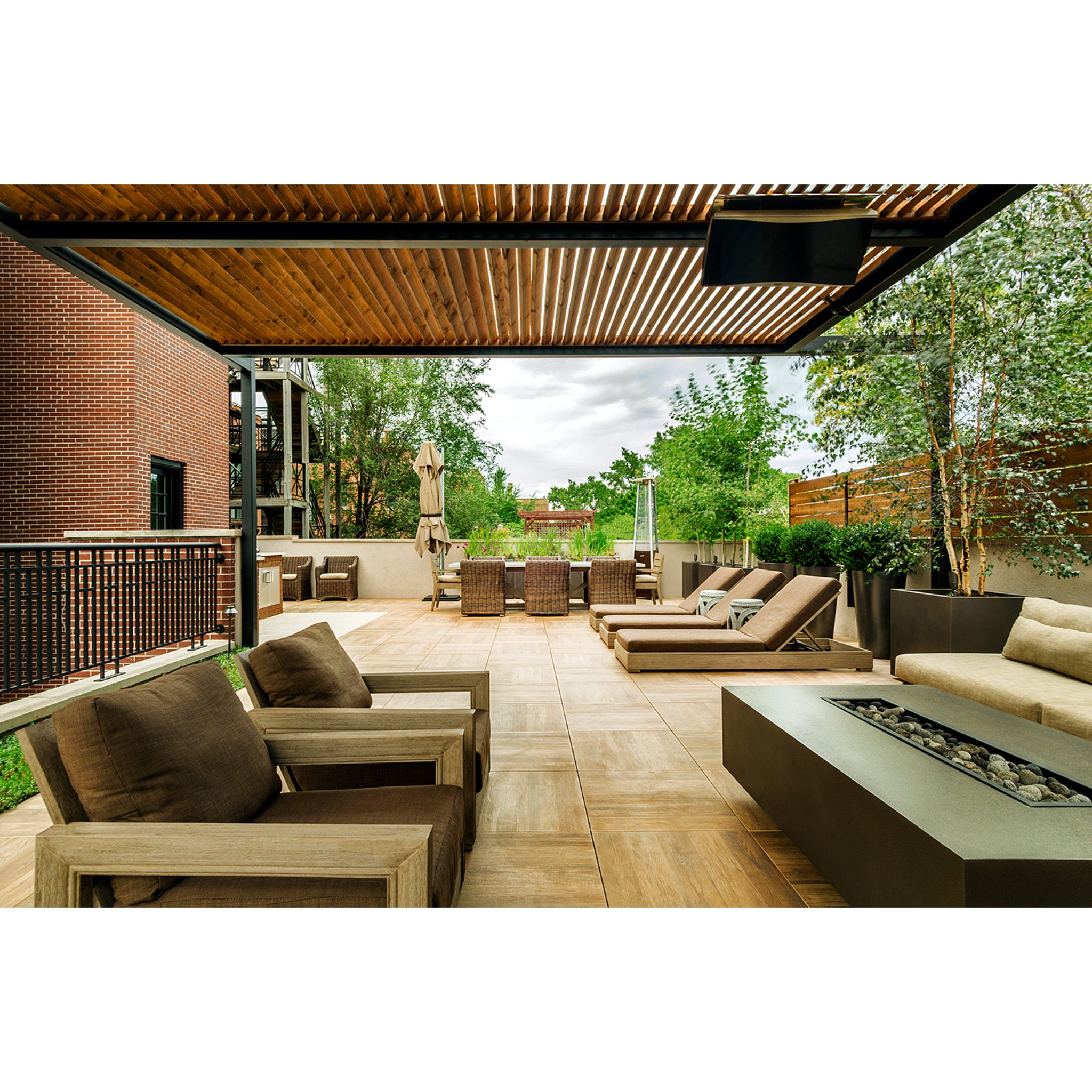 Ceiling mounted Bromic Platinum Smart-Heat gas patio heater installed under covered outdoor living area