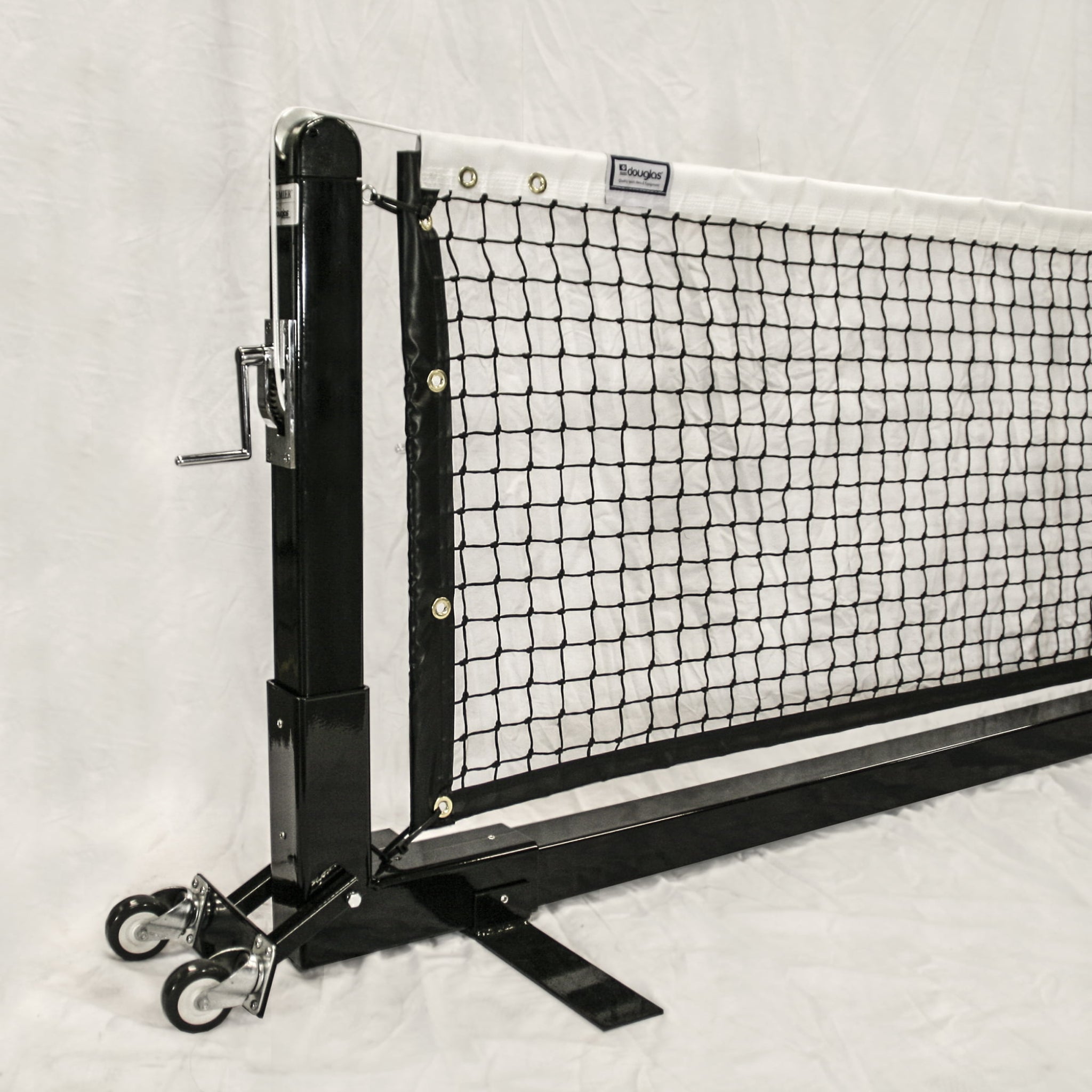 Douglas PPS-22SQ portable pickleball system on outdoor pickleball court