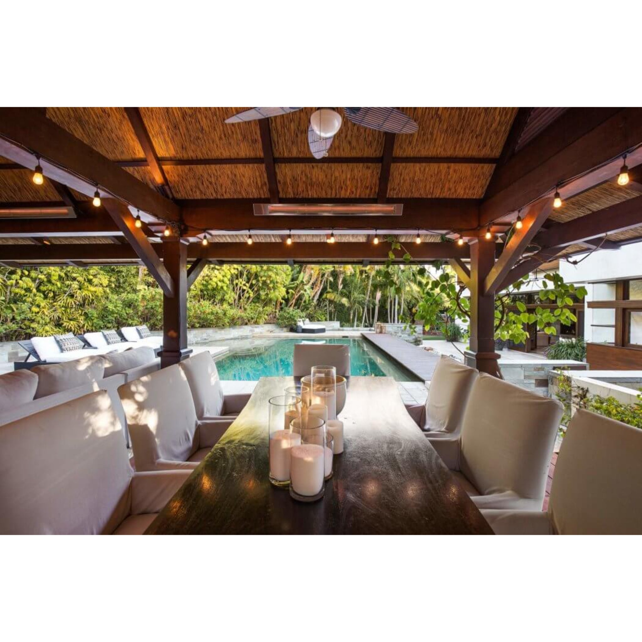 Infratech SL Series infrared patio heater in stainless steel finish in covered outdoor lounge area