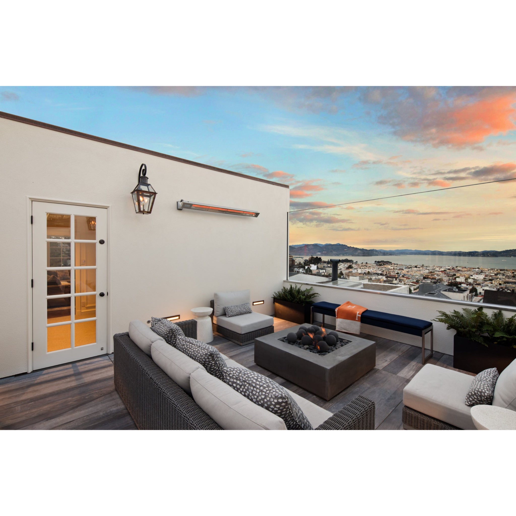 Infratech Slimline single element heater delivering medium wave infrared heat outdoors