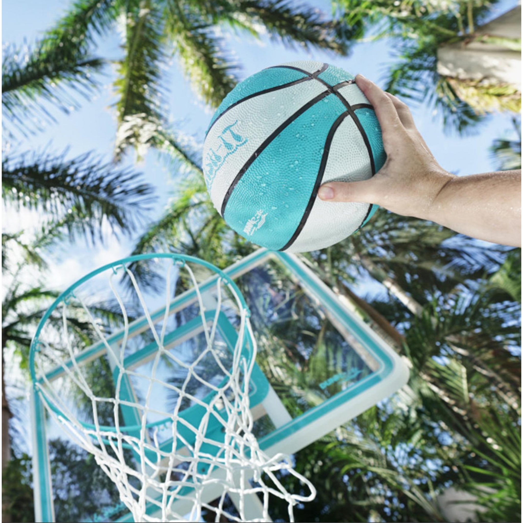 Close-up of Splash & Shoot basketball hoop rim and net over swimming pool