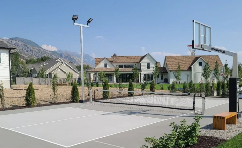 Outdoor sport court lighting system designed for safe and consistent nighttime play