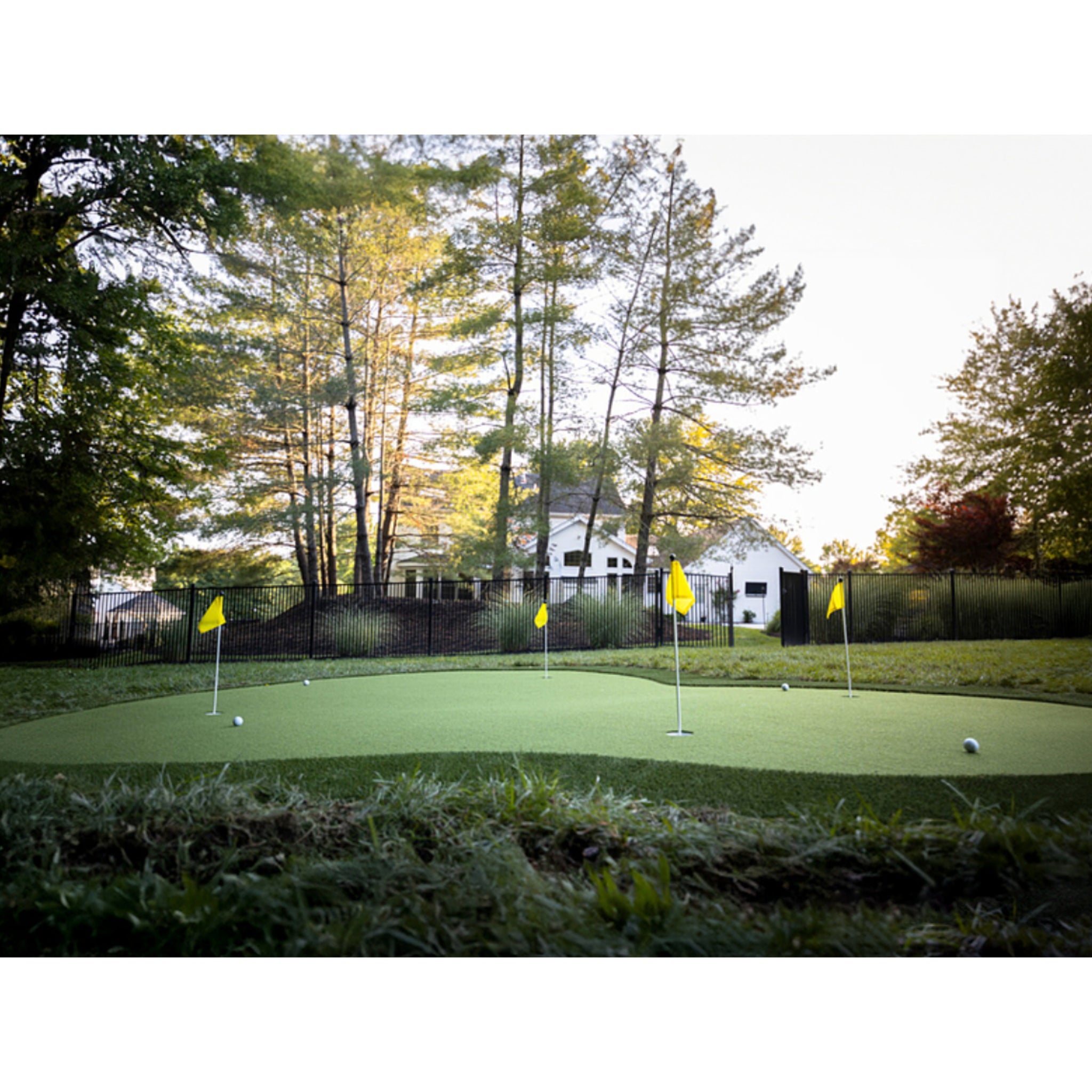 The Southampton Ultra Base backyard outdoor putting green by luxury home, 18 feet by 23 feet, 414 square feet, DIY Residential outdoor putting green system