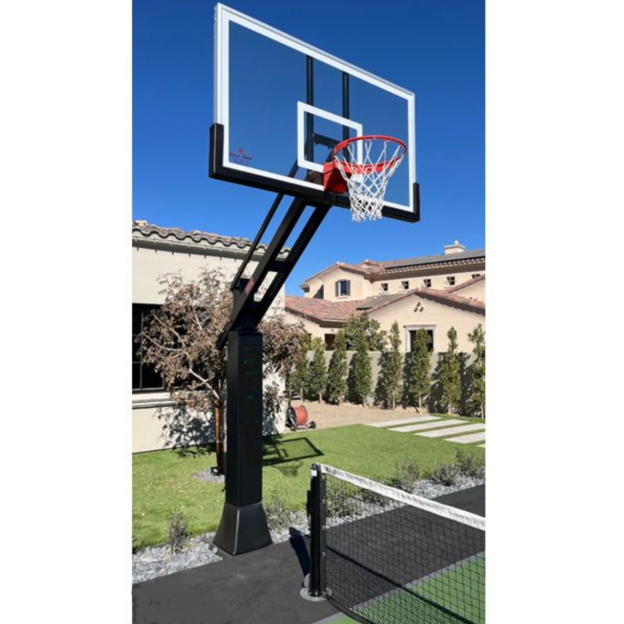 First Team Titan adjustable outdoor basketball hoop with 6 inch steel post