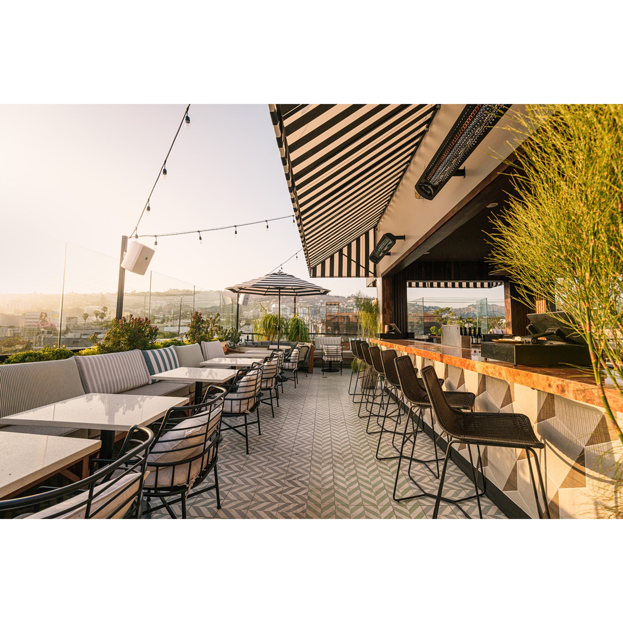 Wall mounted Bromic Tungsten electric infrared patio heater at restaurant in Los Angeles