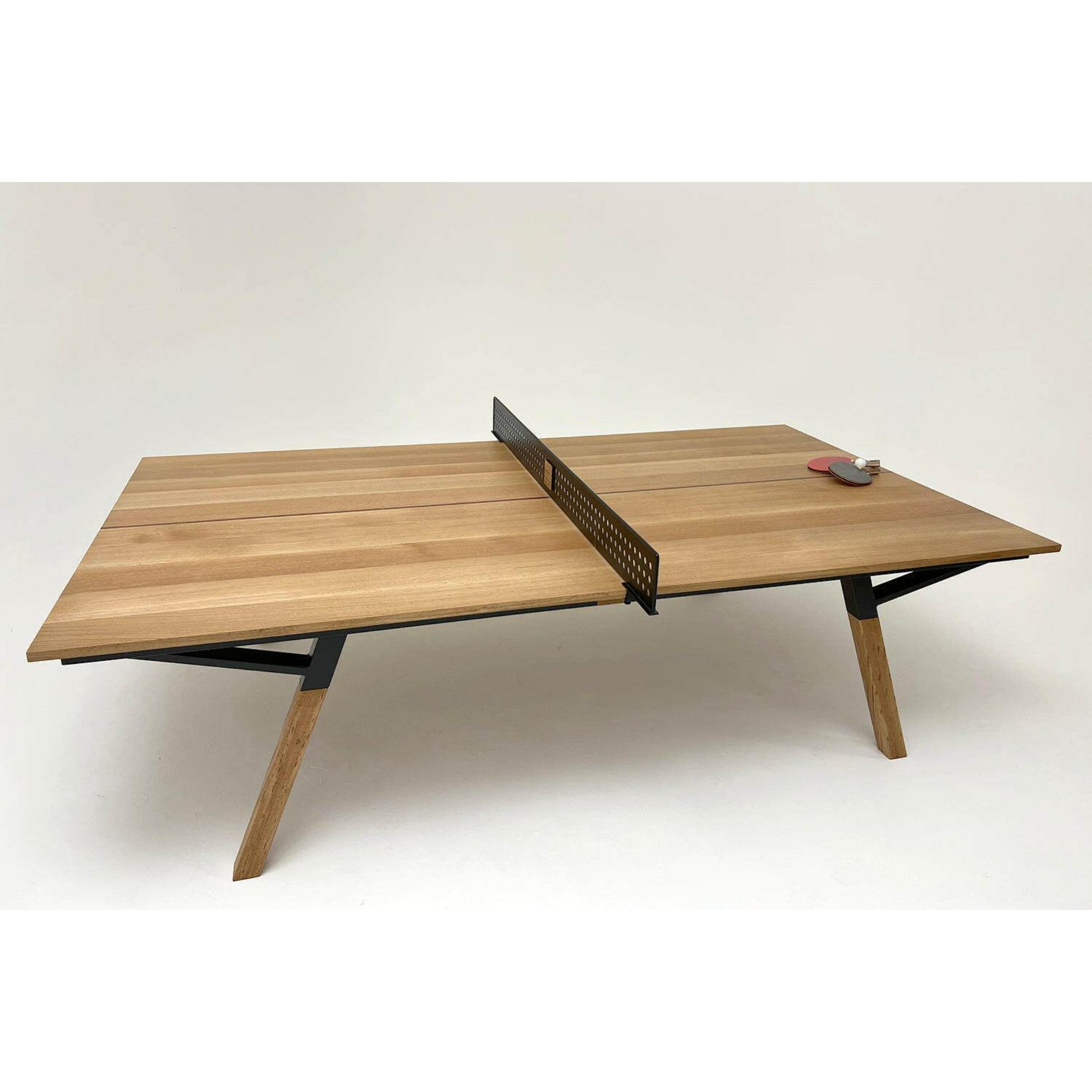 Woolsey ping pong table that doubles as dining table in white oak wood