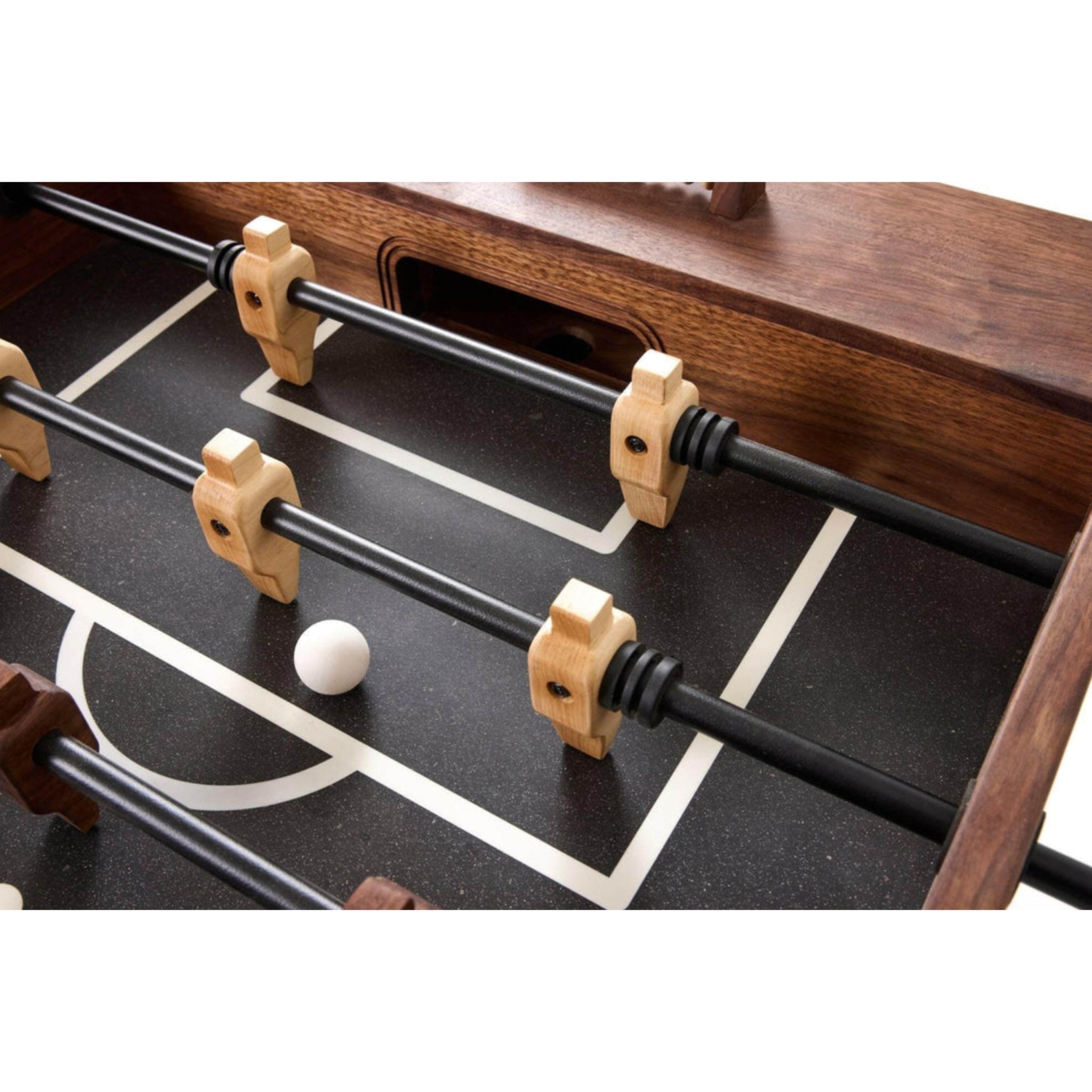 Close up of Sean Woolsey walnut foosball table with black playfiend and wood players