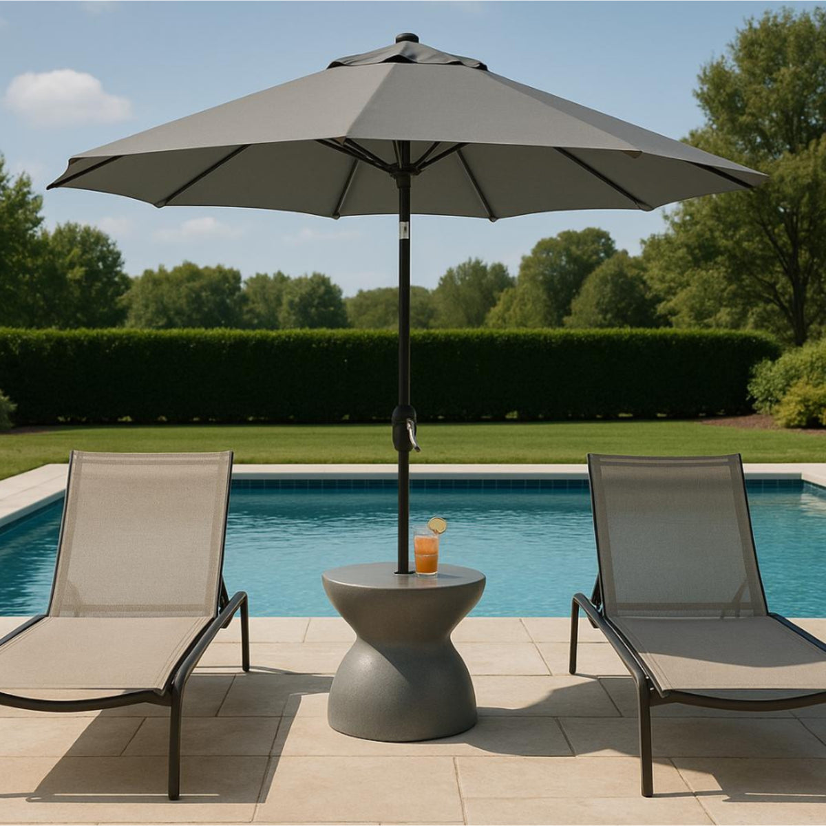 Dunn-Rite ShadeTable US25G Granite water-filled pool umbrella base table with patio umbrella beside poolside lounge chairs