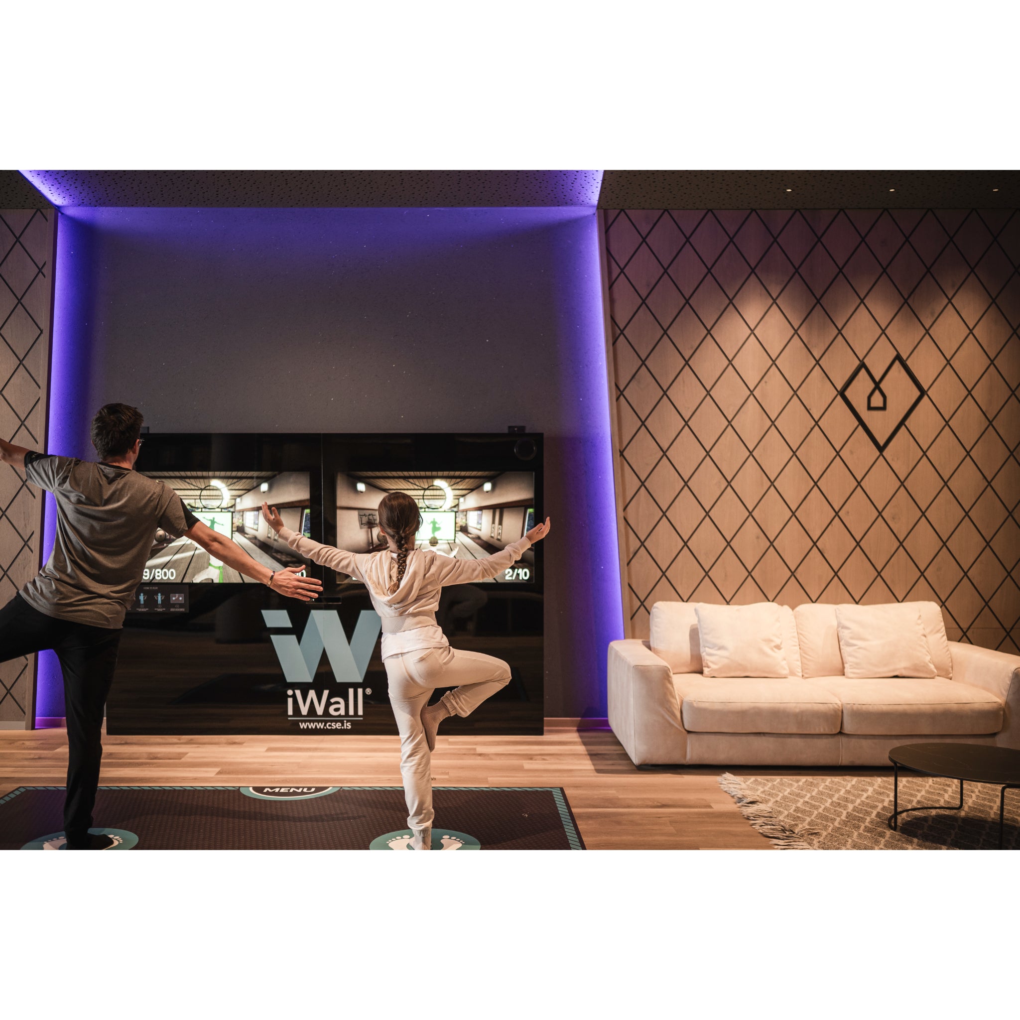 Dual-screen interactive fitness wall system for high-traffic commercial use