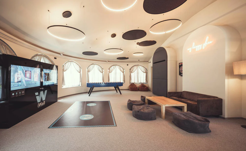 Interactive gaming wall creating an immersive entertainment and fitness experience